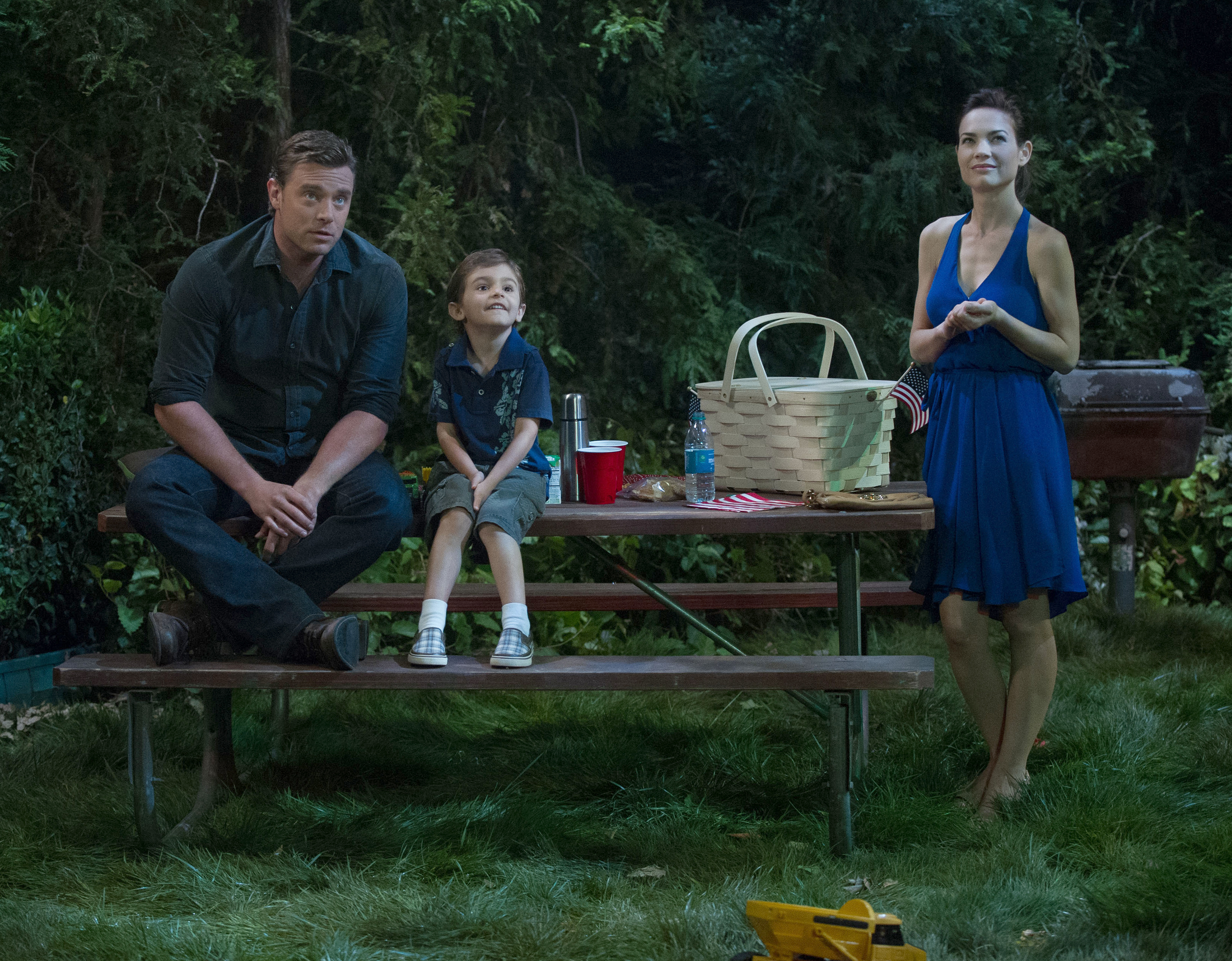 Billy Miller, Jason David, and Rebecca Herbst in an episode of "General Hospital" in 2015 | Source: Getty Images