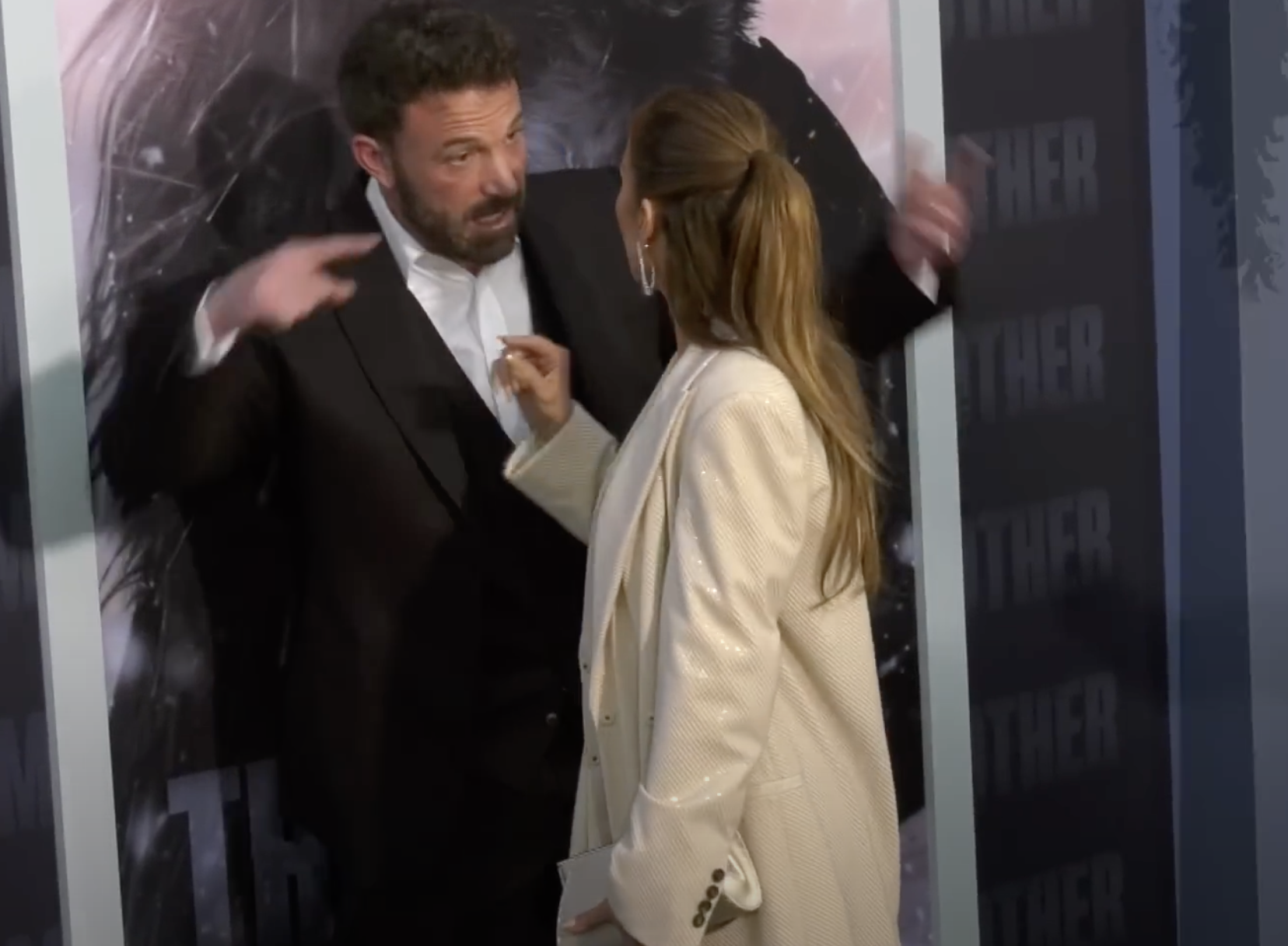 Ben Affleck and Jennifer Lopez seem to argue at Netflix's premiere of "The Mother," dated May 12, 2023 | Source: YouTube/@theindependent