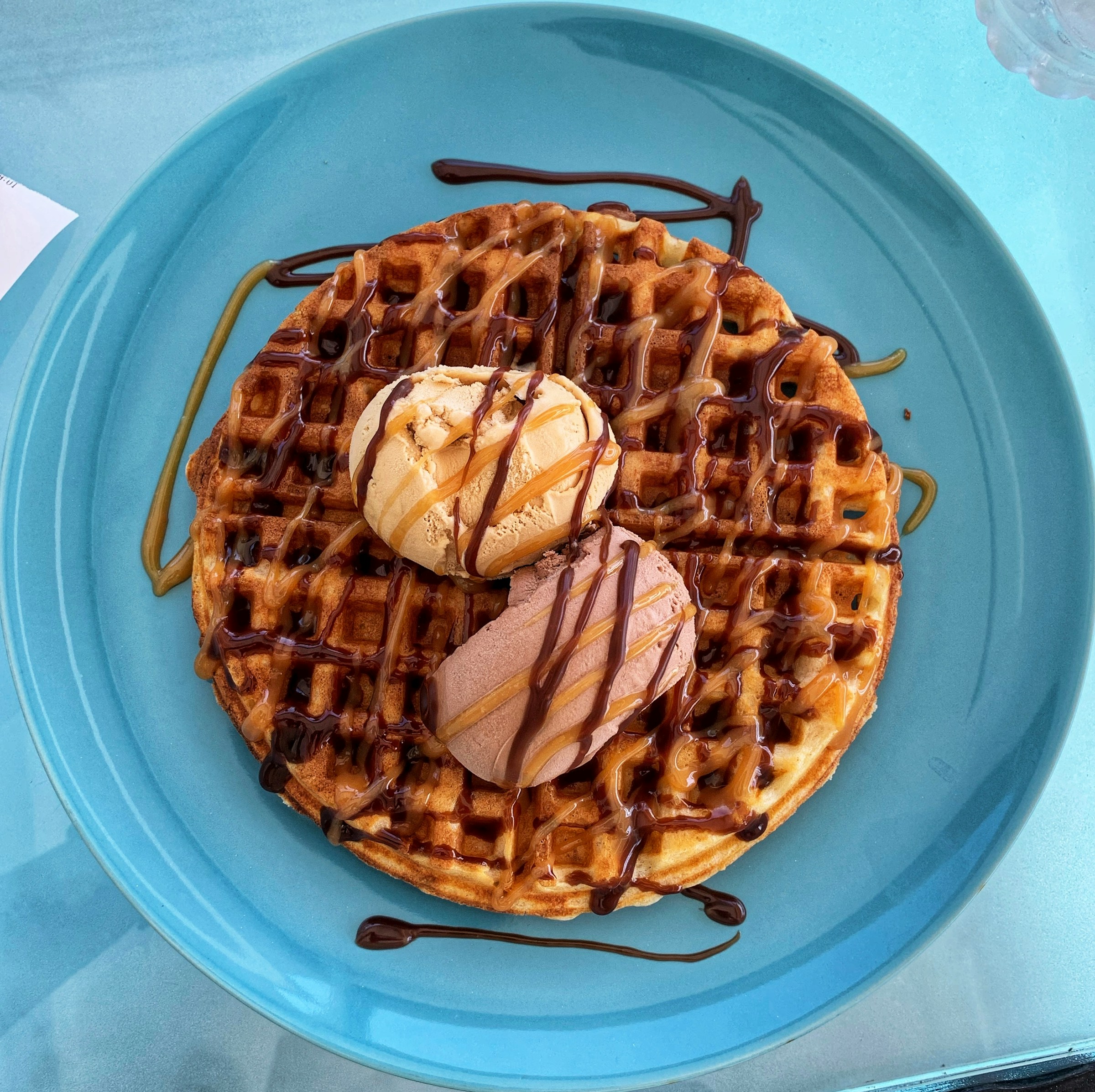 A plate topped with waffles and ice cream | Source: Unsplash