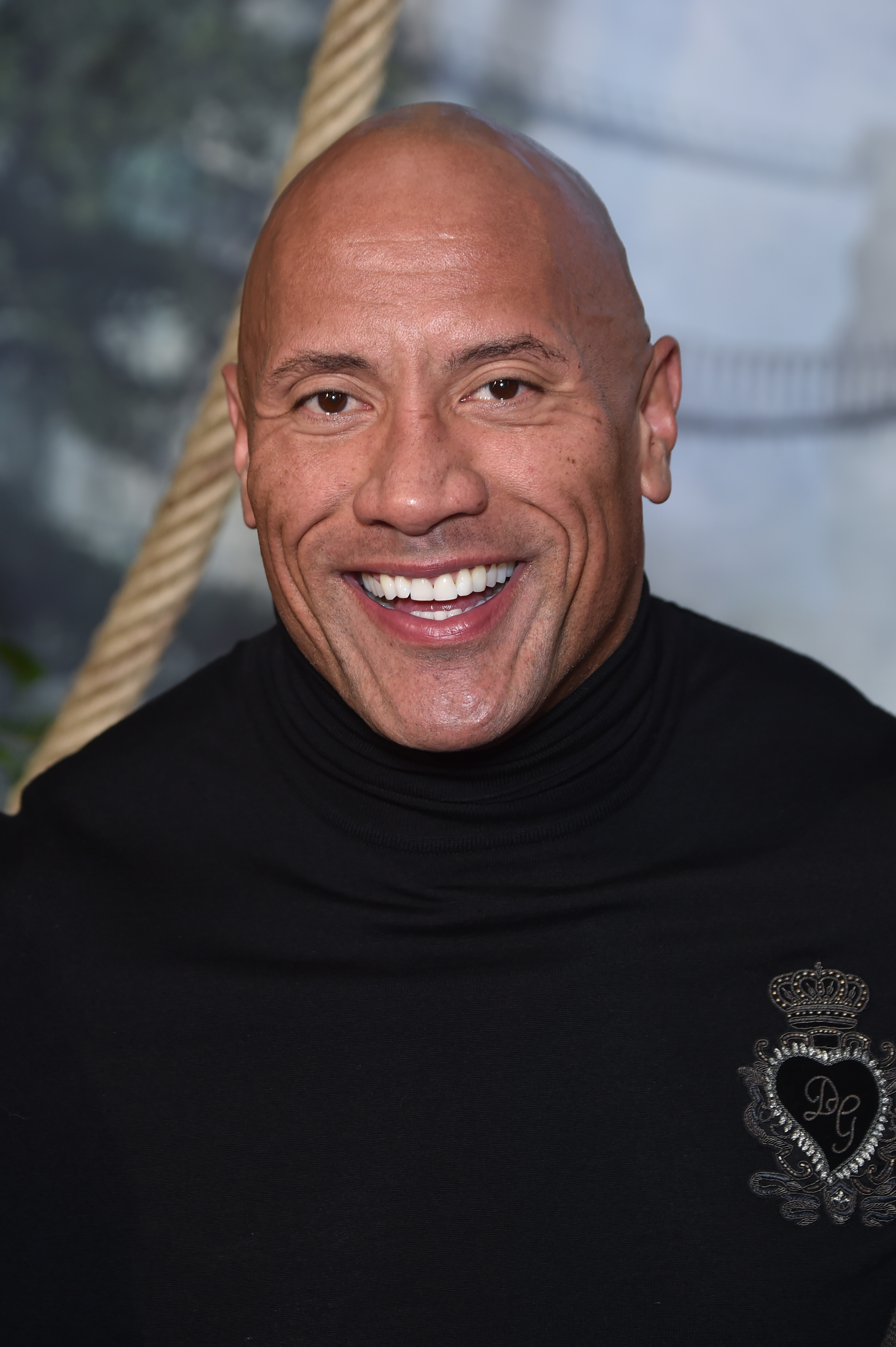 Dwayne Johnson at the photocall for the film "Jumanji: Next Level" at Le Grand Rex on December 3, 2019, in Paris, France | Source: Getty Images
