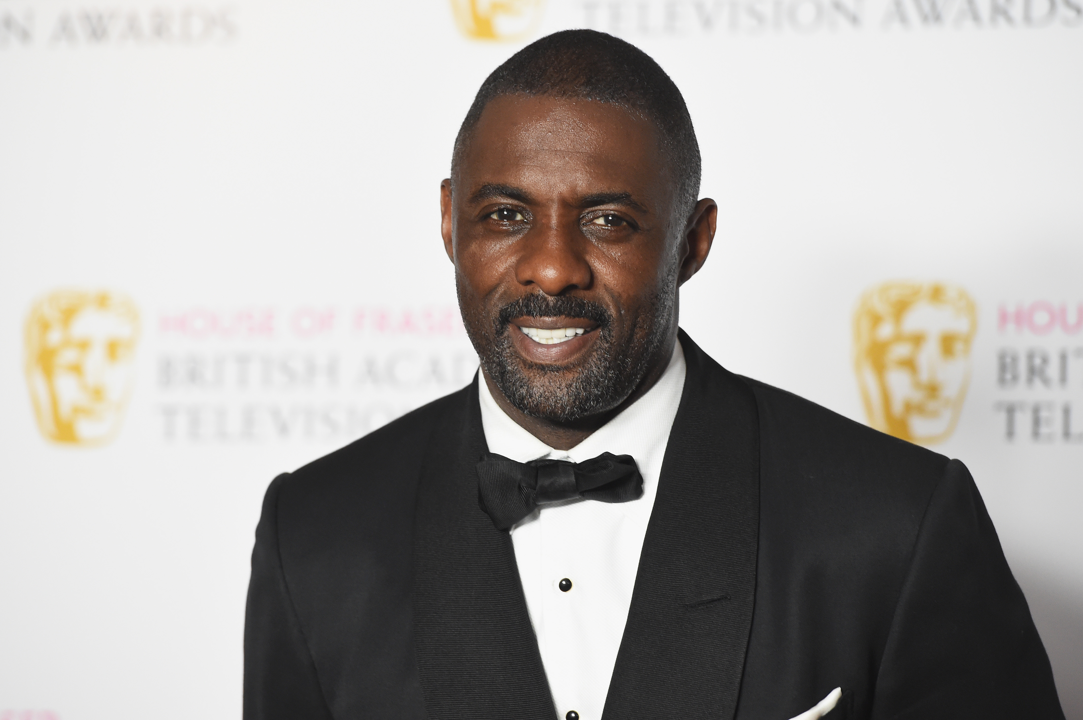 Idris Elba poses in the Winners room at the House Of Fraser British Academy Television Awards 2016 at the Royal Festival Hall on May 8, 2016 in London, England. | Source: Getty Images