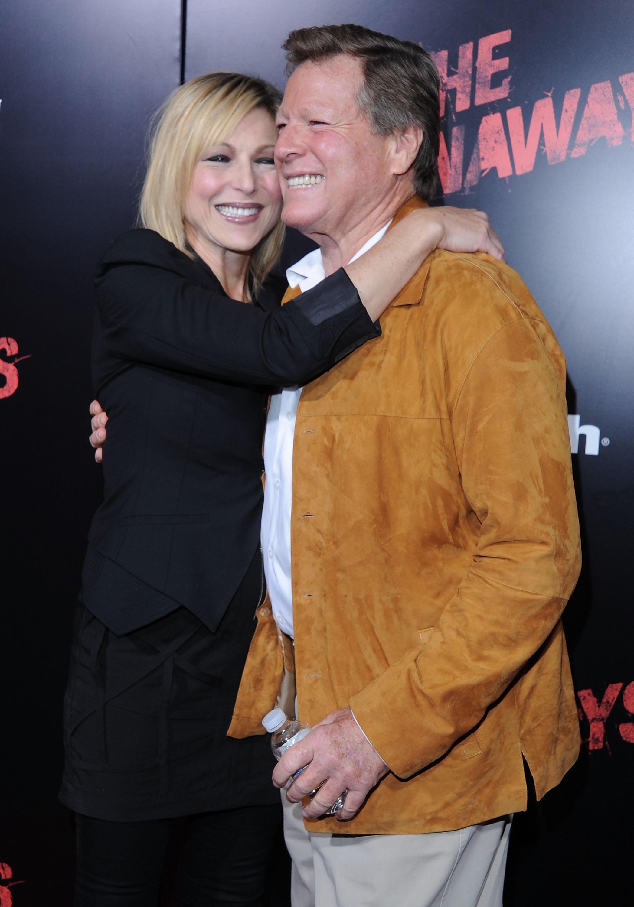 Tatum O'Neal and Ryan O'Neal arrive at the Los Angeles Premiere "The Runaways" on March 11, 2010 in Hollywood, California | Source: Getty Images