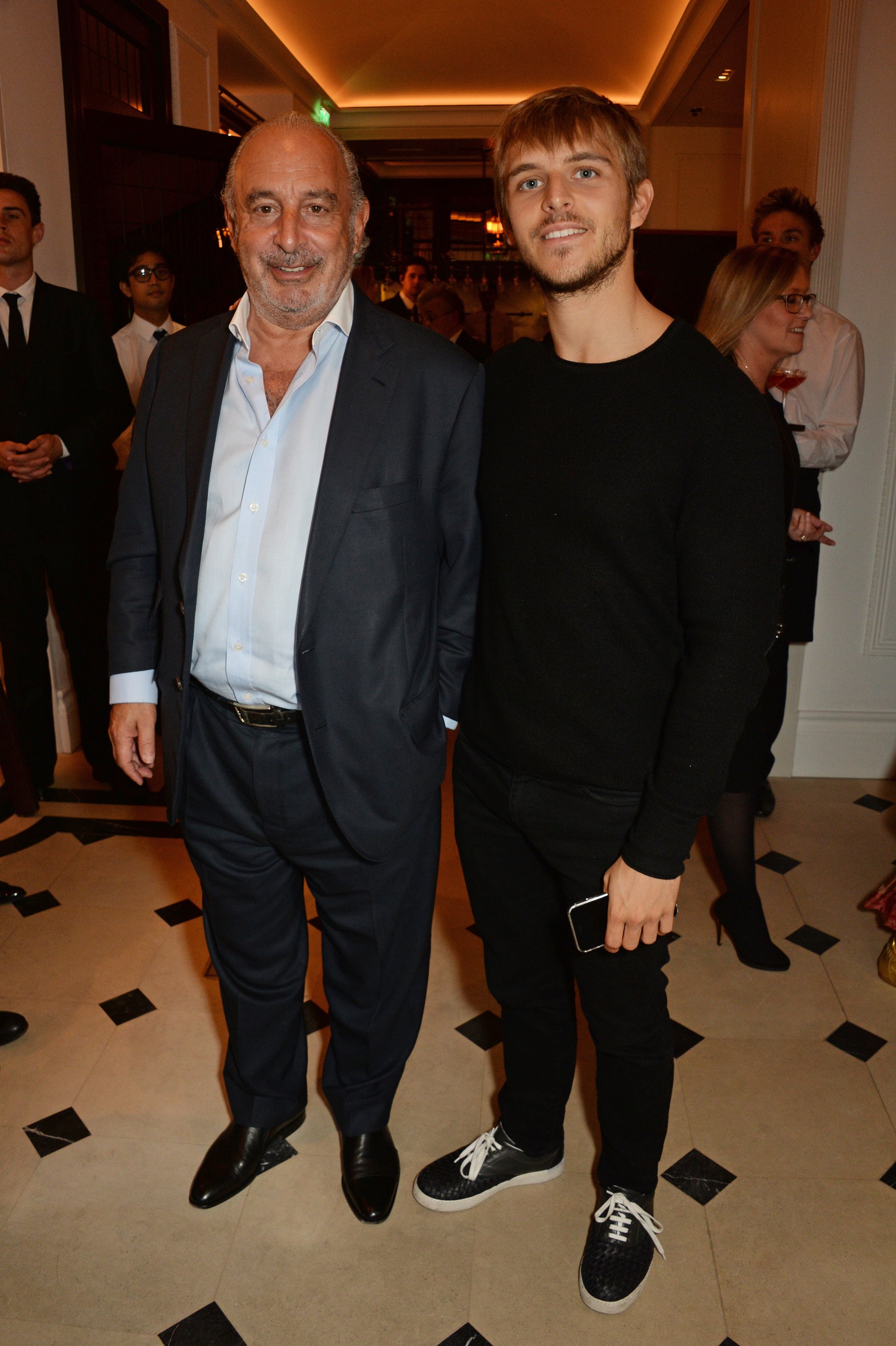 Sir Philip Green and Brandon Green at an event in London on April 18, 2016 | Source: Getty Images
