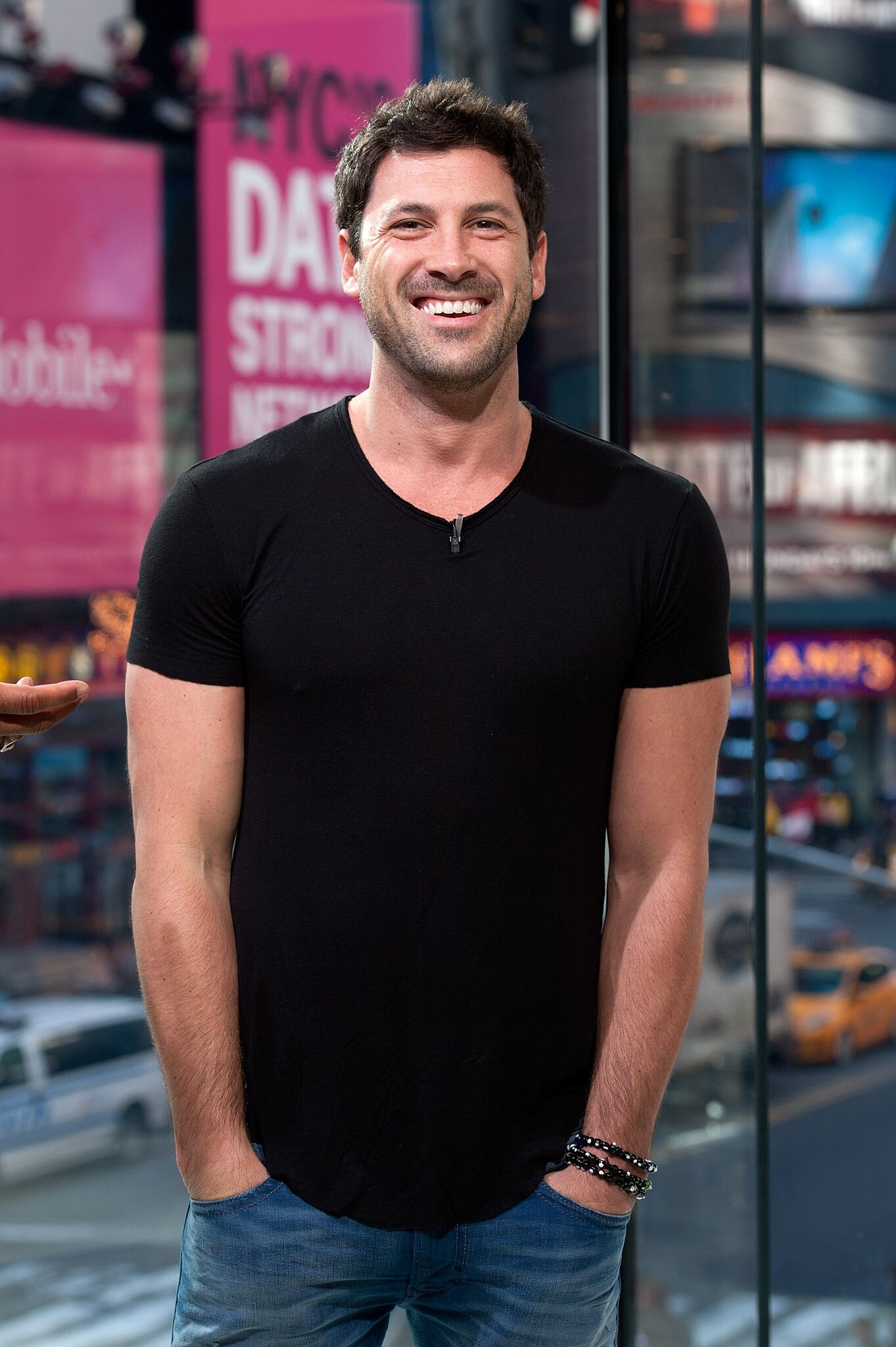 Maksim Chmerkovskiy visits "Extra" at their New York studios at H&M in Times Square on April 13, 2015 | Getty Images