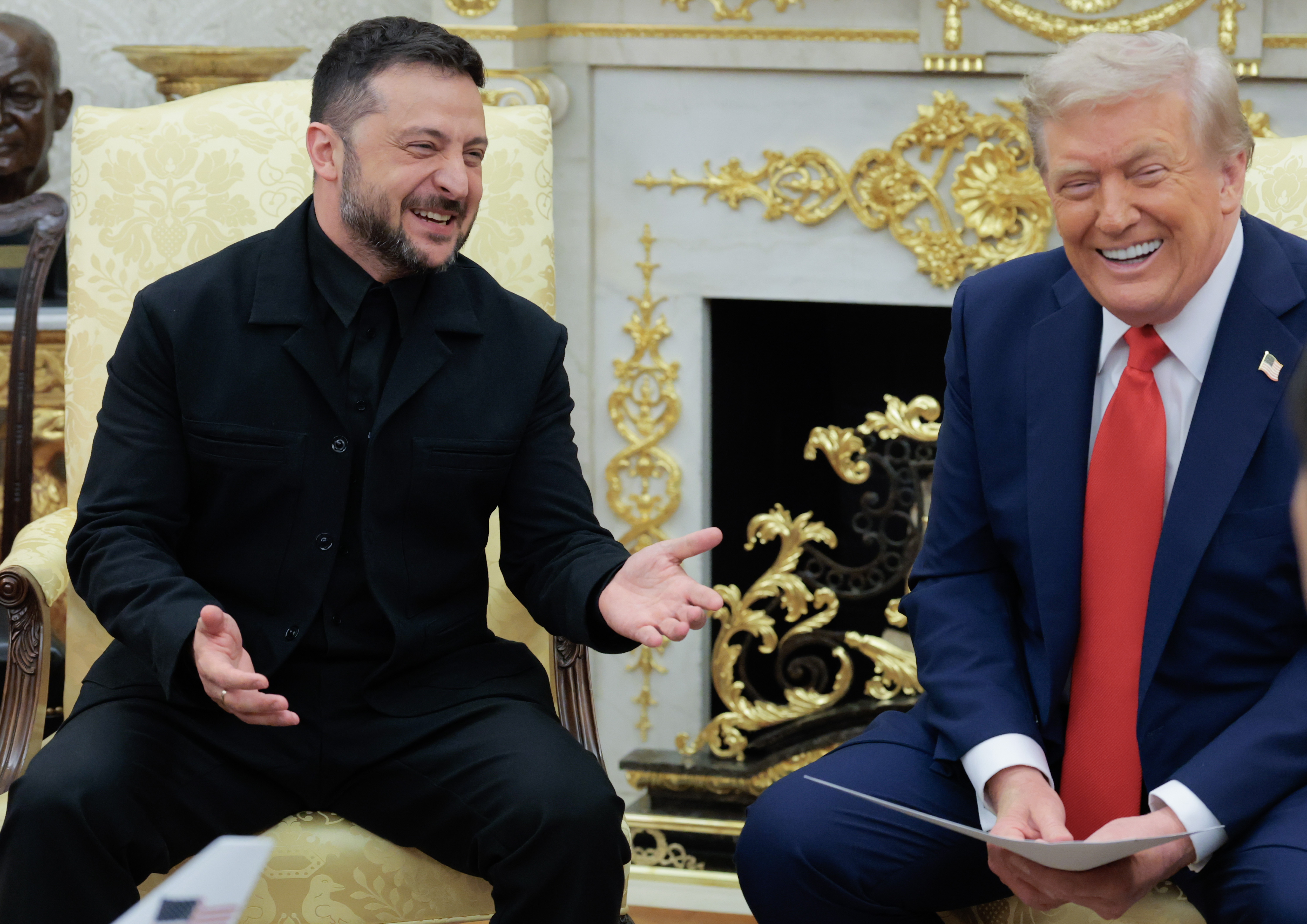 Ukrainian President Volodymyr Zelenskyy and U.S. President Donald Trump share a light moment during their White House meeting on August 18, 2025 | Source: Getty Images