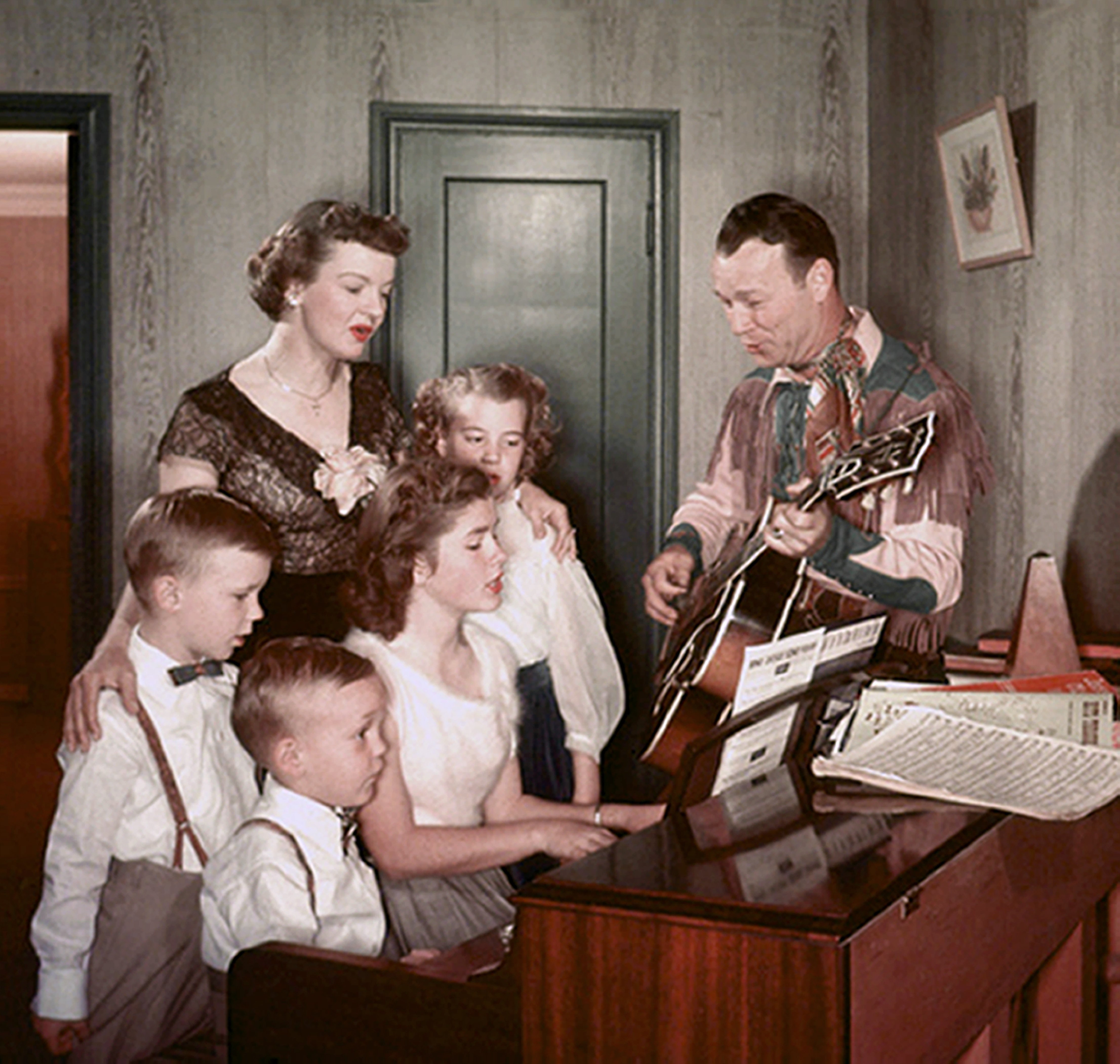 Roy Rogers and Dale Evans with their children in their home in 1958. | Source: Getty Images 