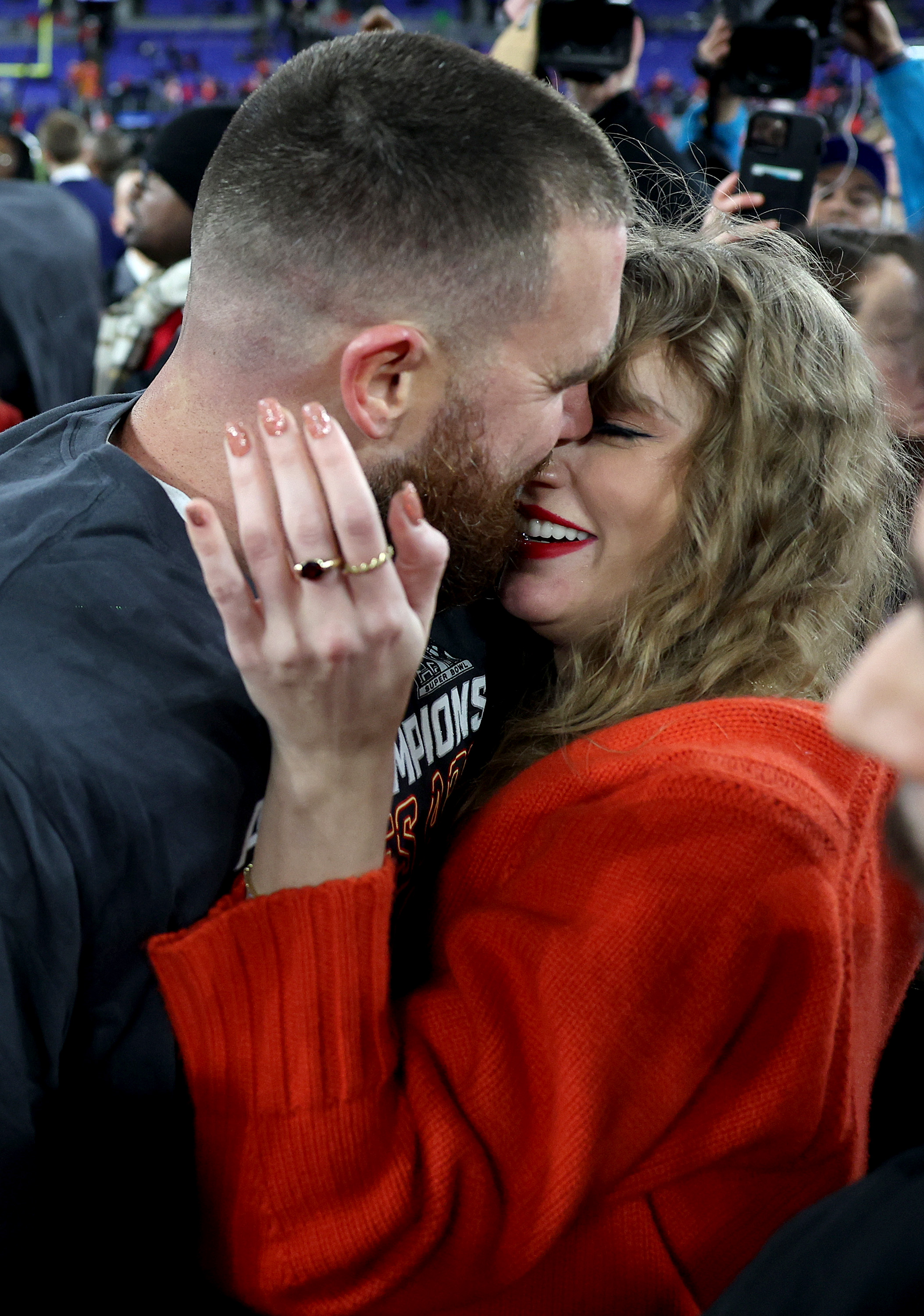 Travis Kelce celebrates with Taylor Swift after a 17-10 victory against the Baltimore Ravens in the AFC Championship Game in Baltimore, Maryland, on January 28, 2024 | Source: Getty Images