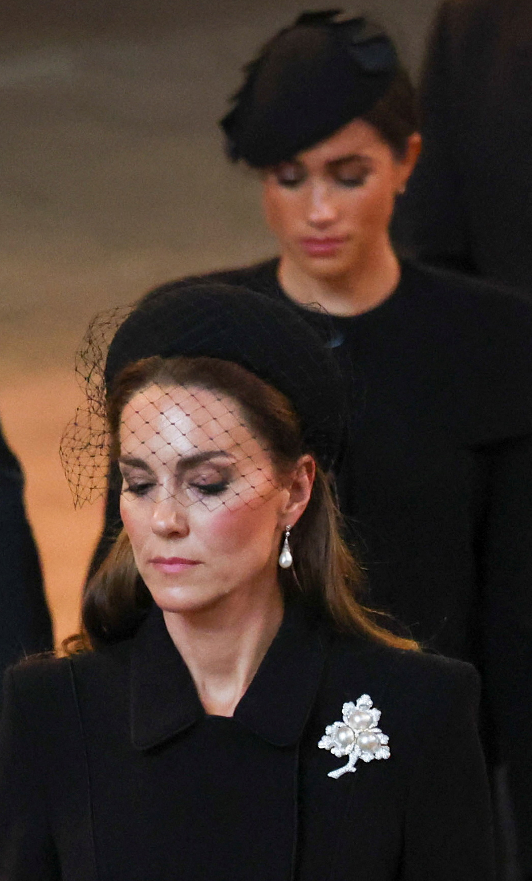 Princess Catherine and Meghan Markle at the State Funeral of Queen Elizabeth II at Westminster Abbey on September 19, 2022 in London, England | Source: Getty Images