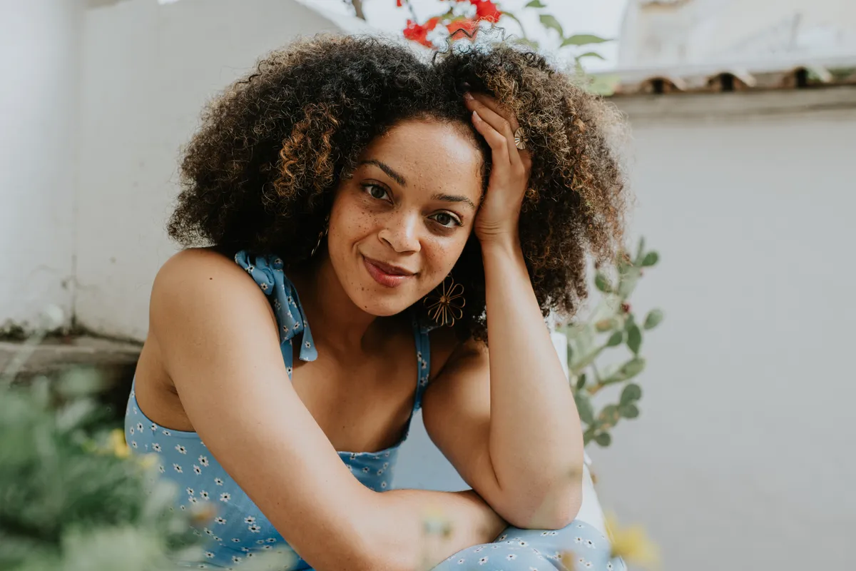 A portrait of a young, beautiful mixed-race woman | Source: Getty Images