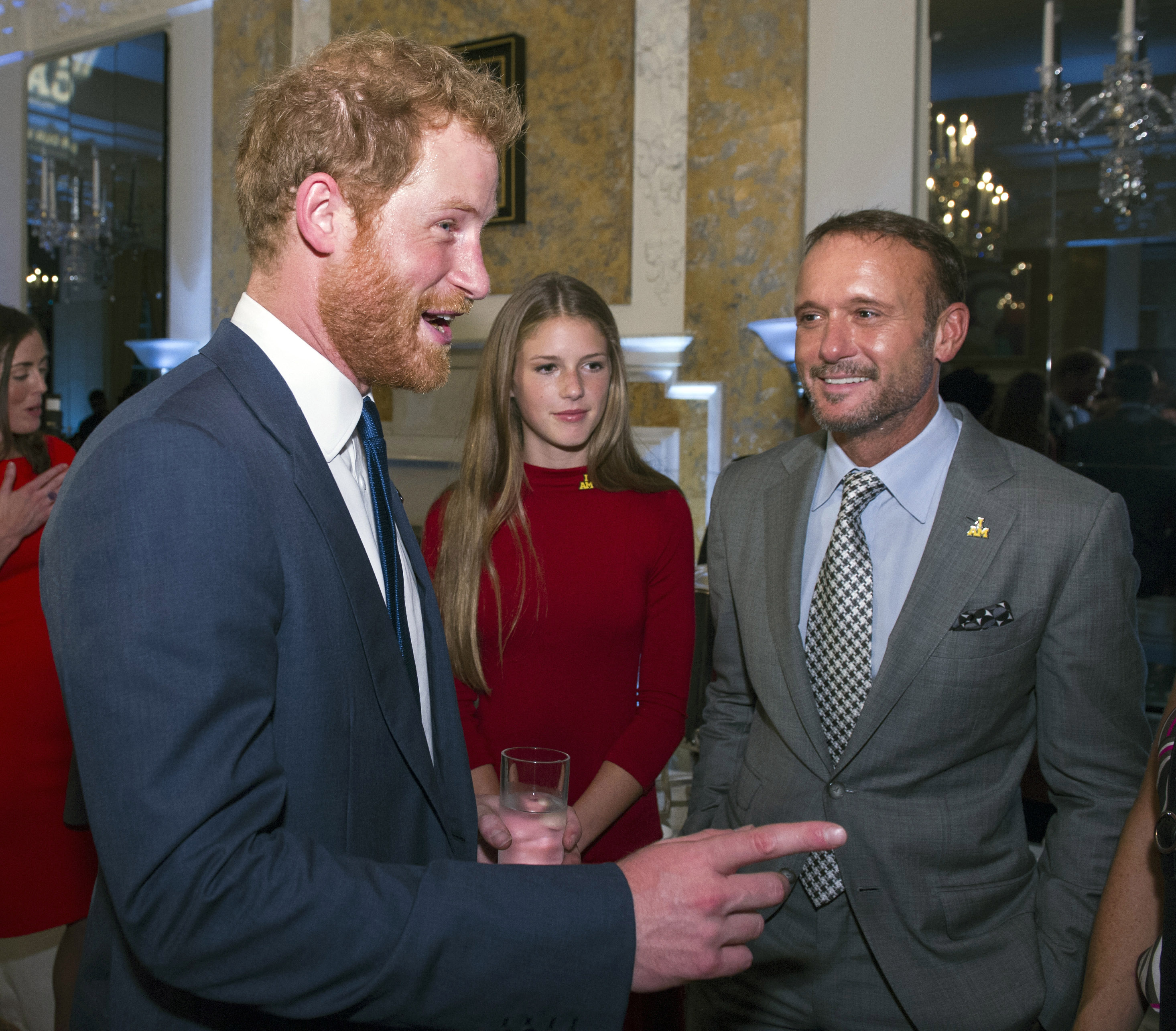 Maggie McGraw attends an Invictus Games reception with her father, Tim McGraw, in 2015. She later chose a career in public service, earning a master's degree and working on Capitol Hill. | Source: Getty Images