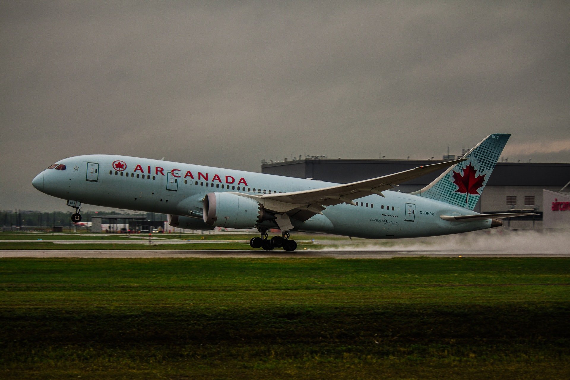 A plane on the tarmac | Photo: Vincent Albos / condowizard.ca 