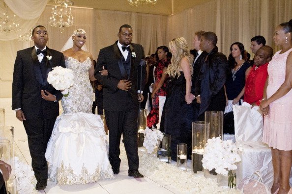 Sons Brentt Leakes and Bryson Bryant walking their mother Nene Leakes down the aisle | Photo: Getty Images