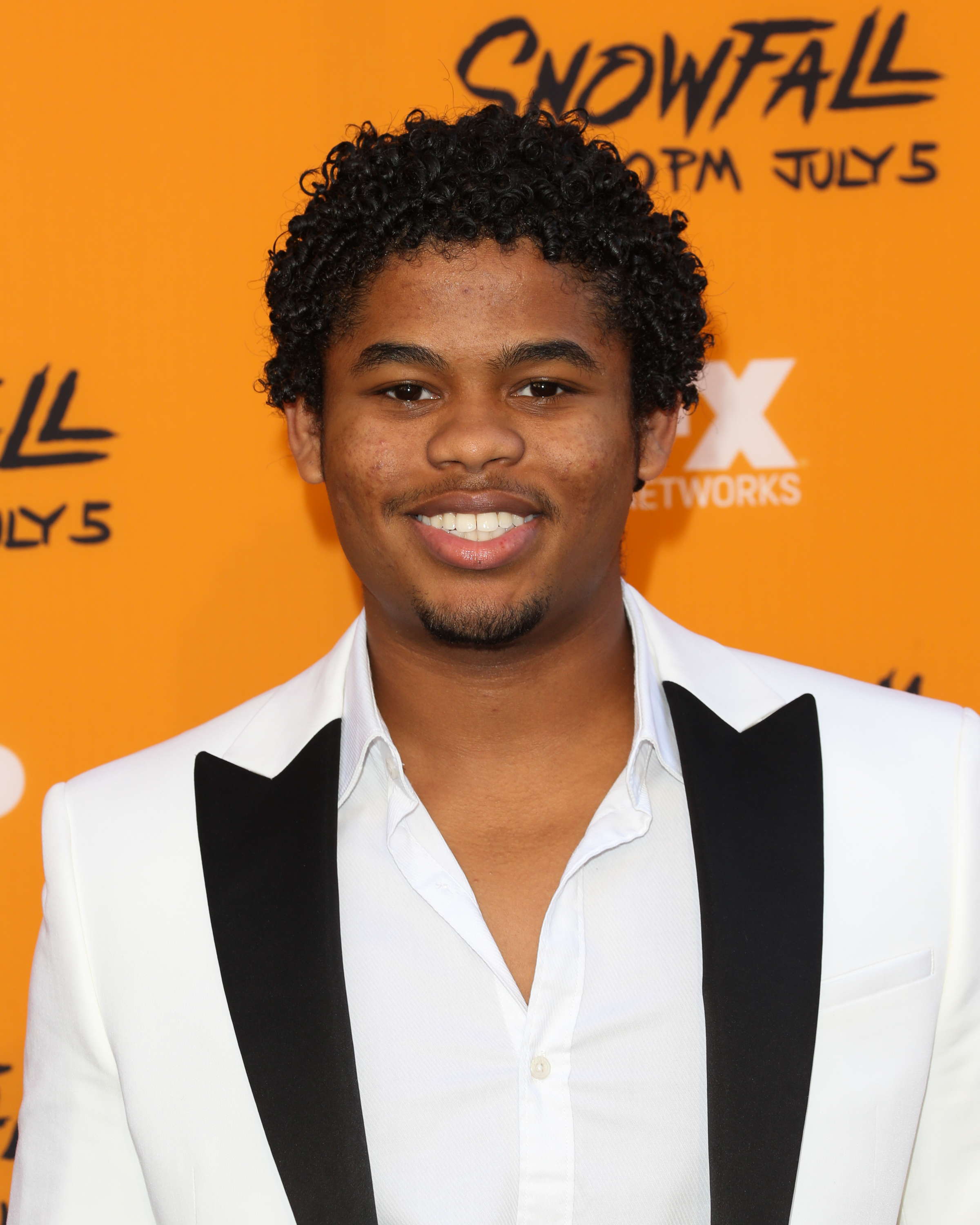 Actor Isaiah John attends the premiere of FX's "Snowfall" at The Theatre at Ace Hotel on June 26, 2017 in Los Angeles, California | Source: Getty Images