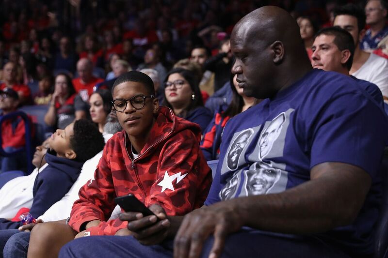 Shaquille and Shareef O'Neal sit courtside at an NBA game | Source: Getty Images/GlobalImagesUkraine