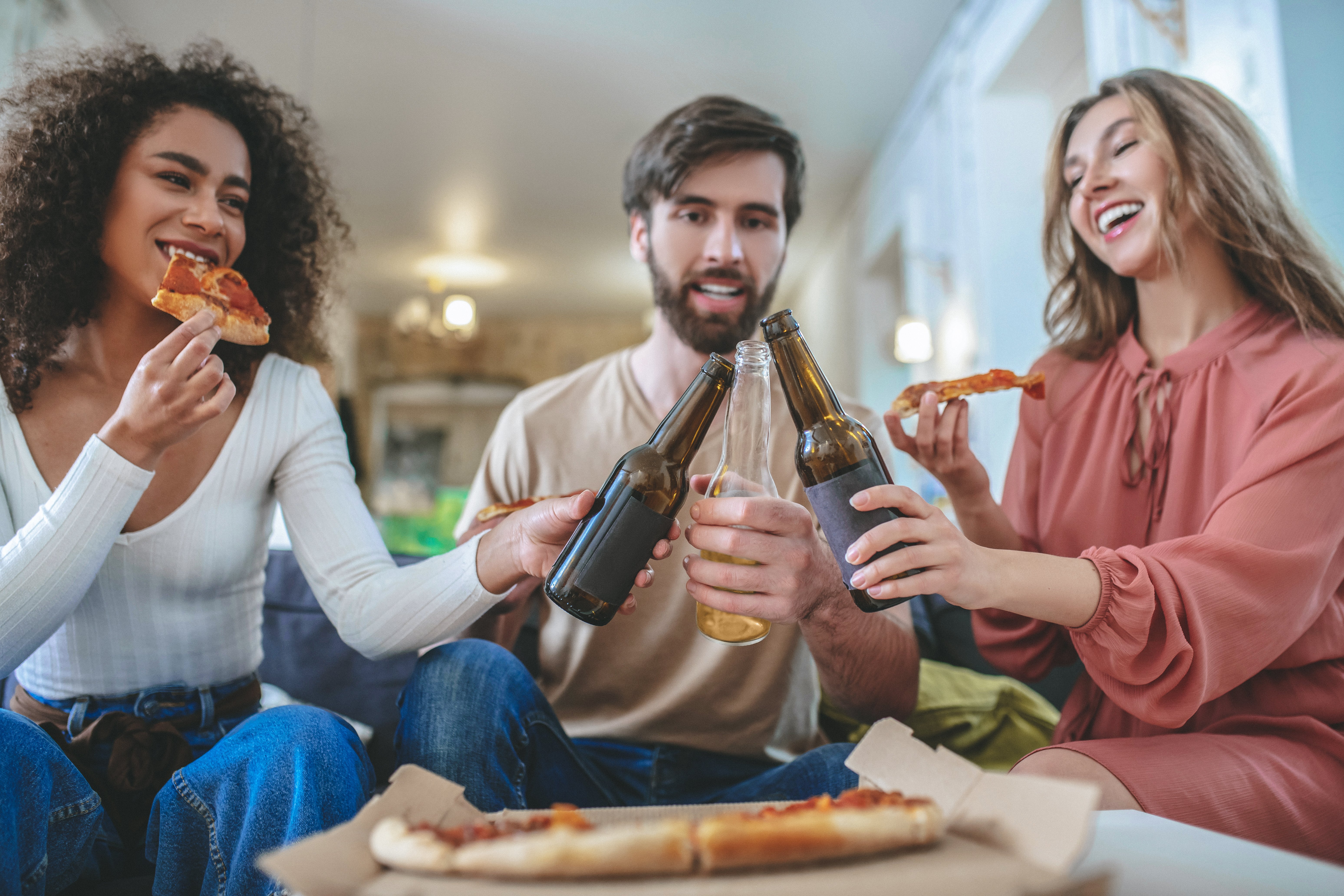 Young adults enjoying themselves together. │Source: Shutterstock