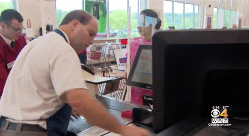 Briar Poirier, a Market Basket employee, at the grocery during his shift. | Source: CBS Boston