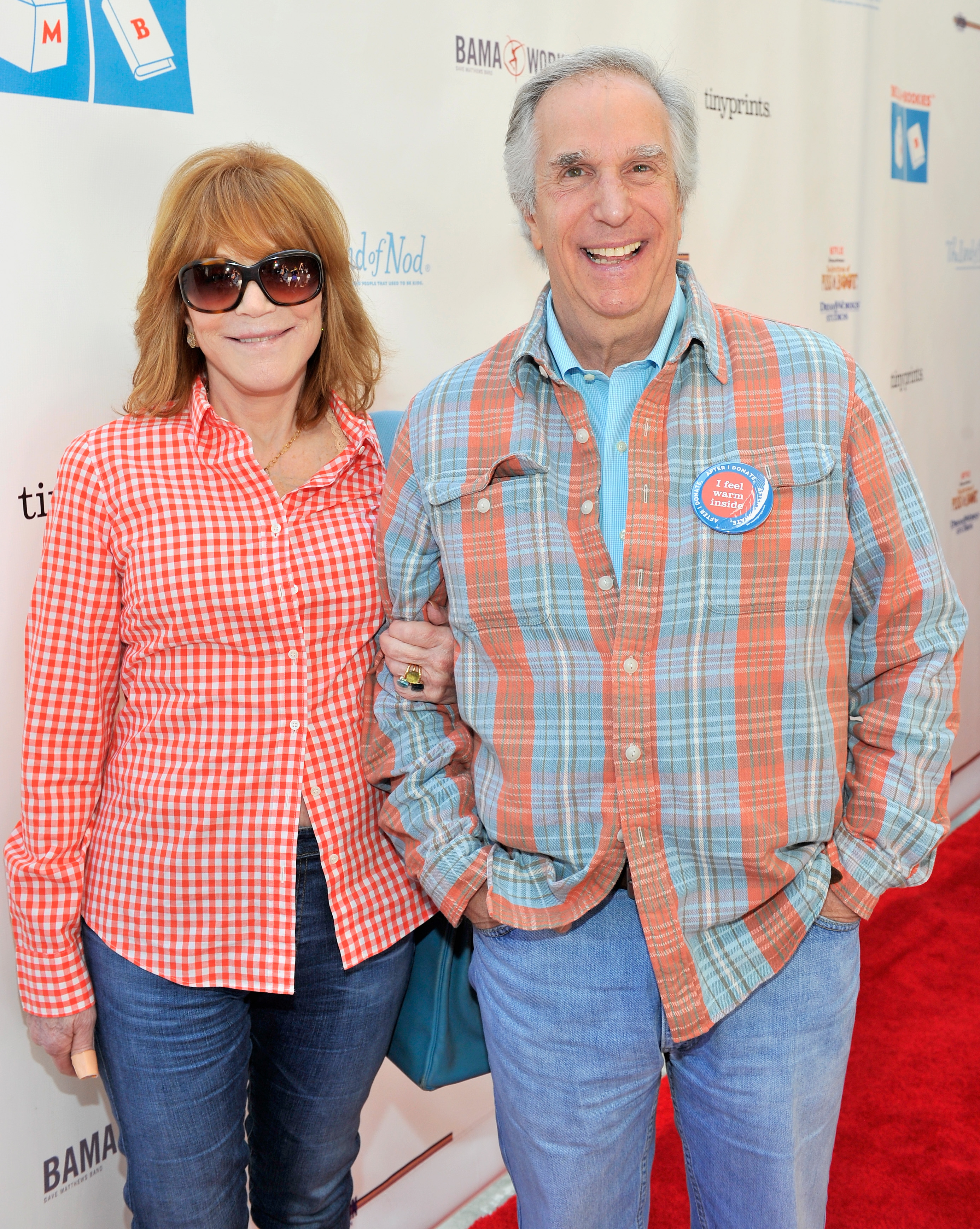 Stacey Weitzman and Henry Winkler at the Milk + Bookies 6th Annual Story Time Celebration in Los Angeles, California on April 19, 2015 | Source: Getty Images