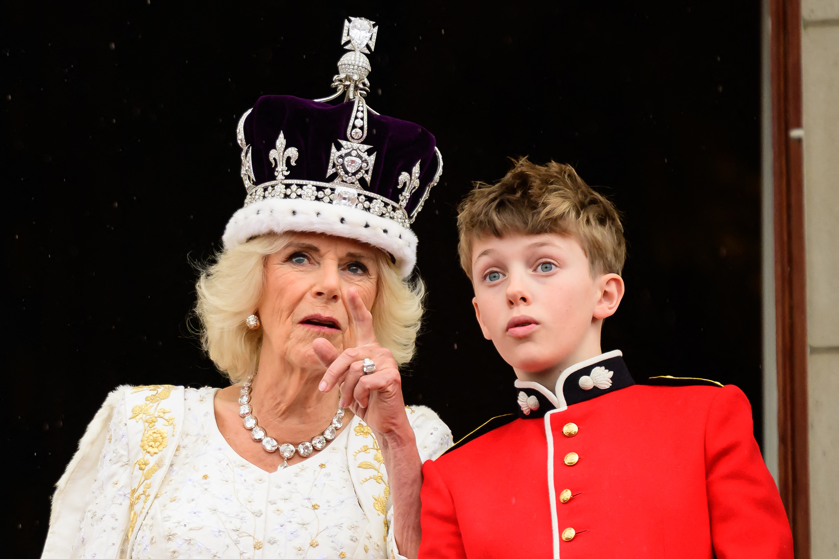 Queen Camilla and her grandson, Freddy Parker Bowles, on the Buckingham Palace balcony in London, following her coronation, on May 6, 2023. | Source: Getty Images