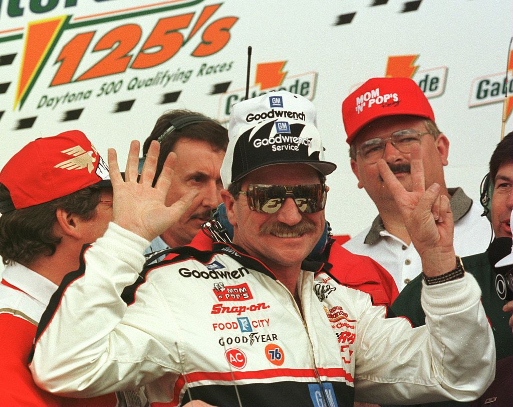 Dale Earnhardt celebrates his seventh Gatorade125 Qualifying race at the Daytona International Speedway in Daytona Beach, Florida on February 15, 1996. | Photo: Getty Images