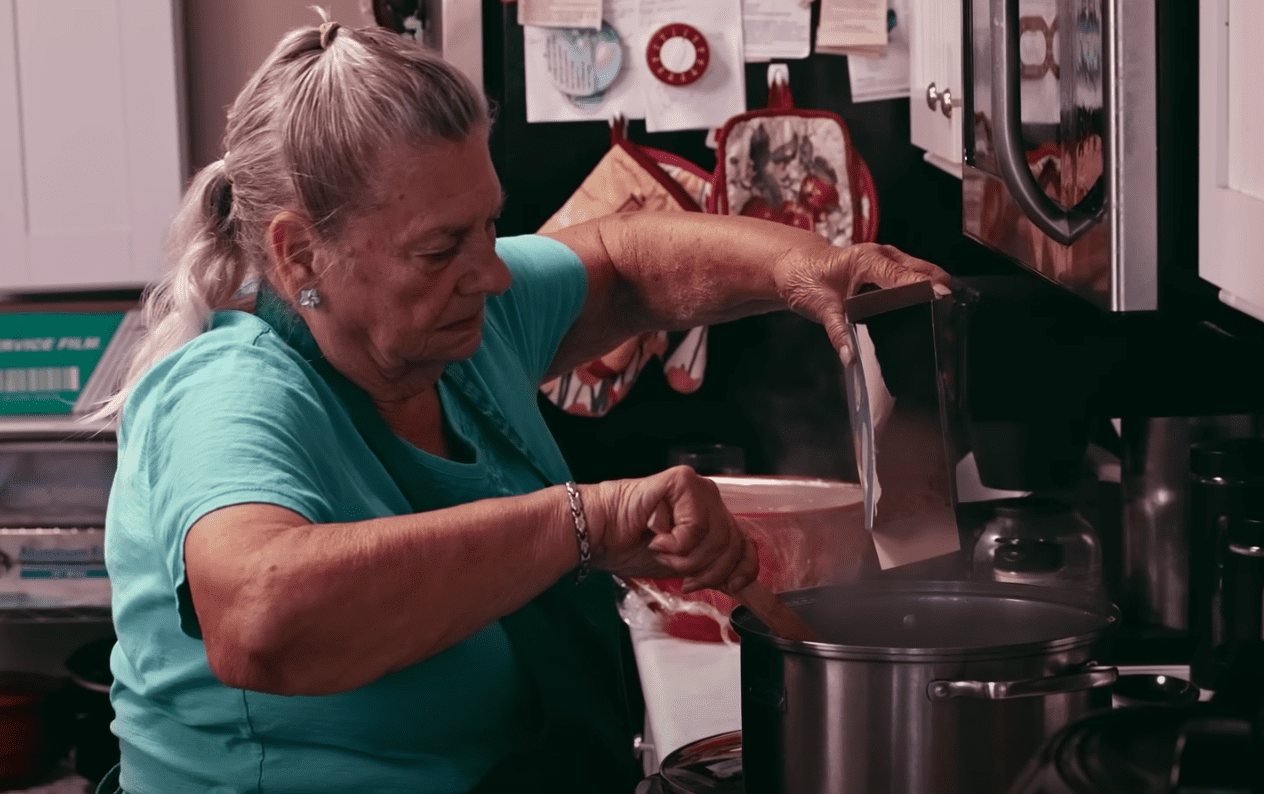 Norma Thornton cooking. | Source: youtube.com/Institute for Justice