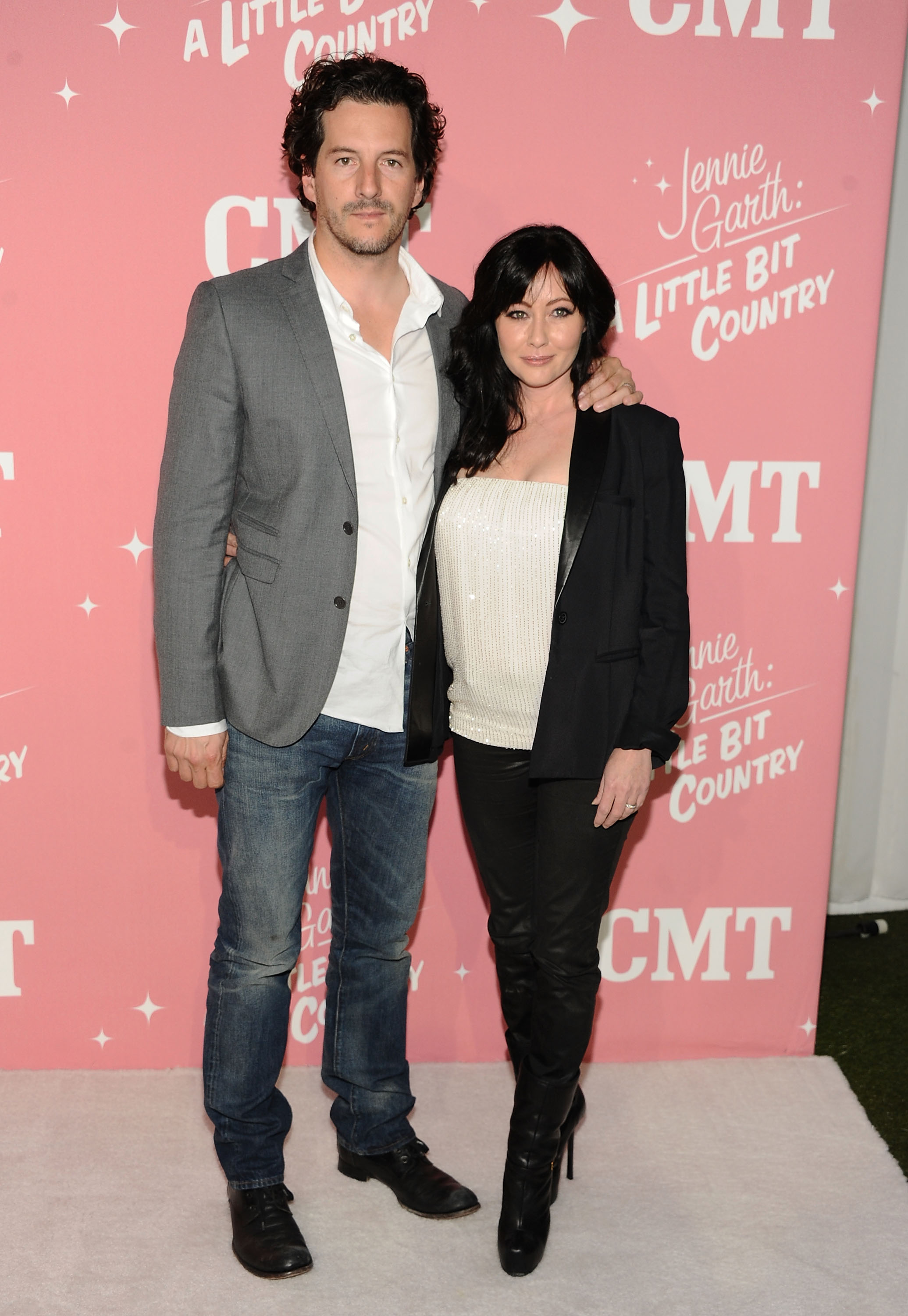 Shannen Doherty and Kurt Iswarienko attend Jennie Garth's 40th birthday celebration and premiere party for "Jennie Garth: A Little Bit Country" at The London Hotel in West Hollywood, California on April 19, 2012. | Source: Getty Images