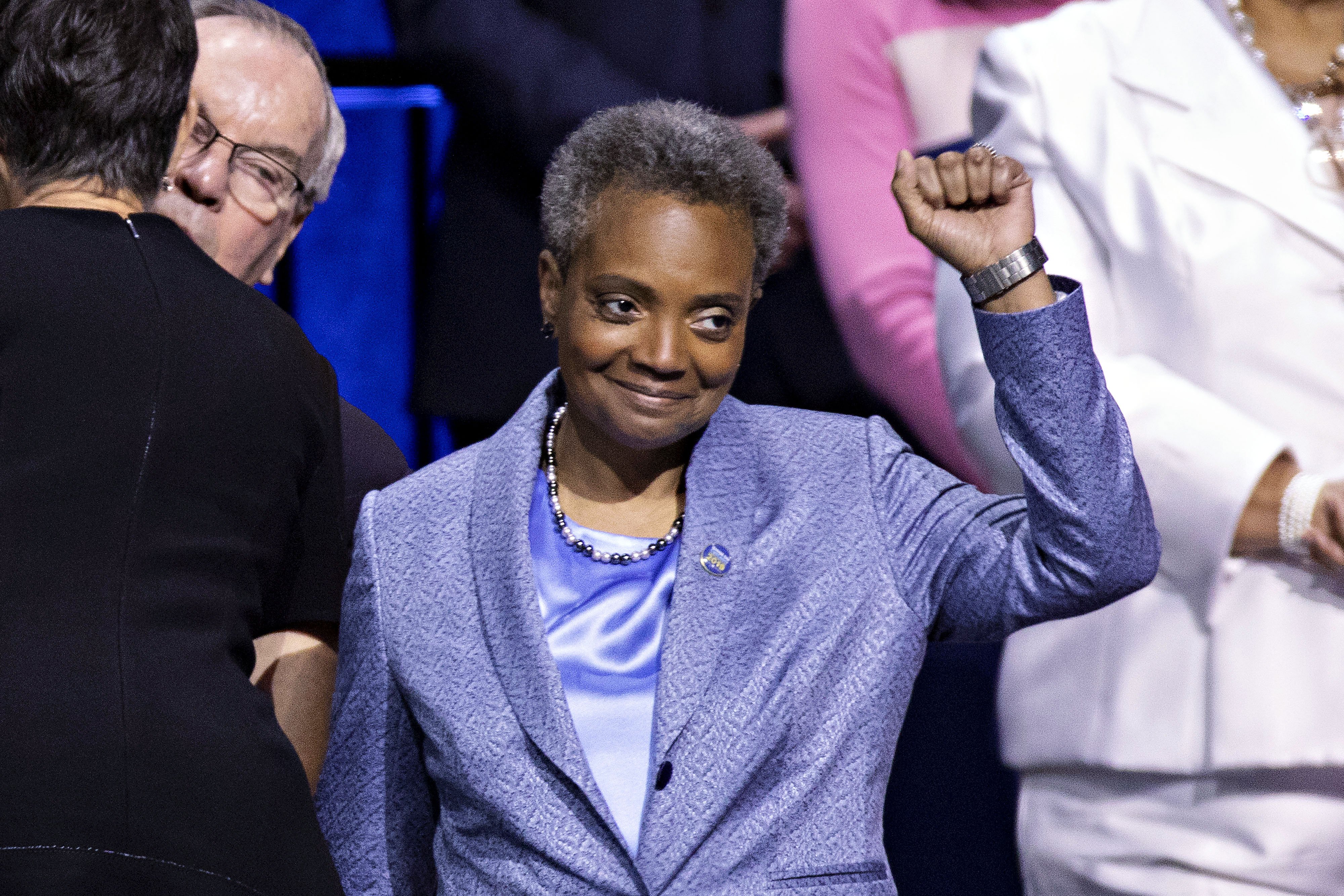 Lori Lightfoot raises her fist during an inauguration ceremony in Chicago, Illinois, on May 20, 2019. | Source: Getty Images