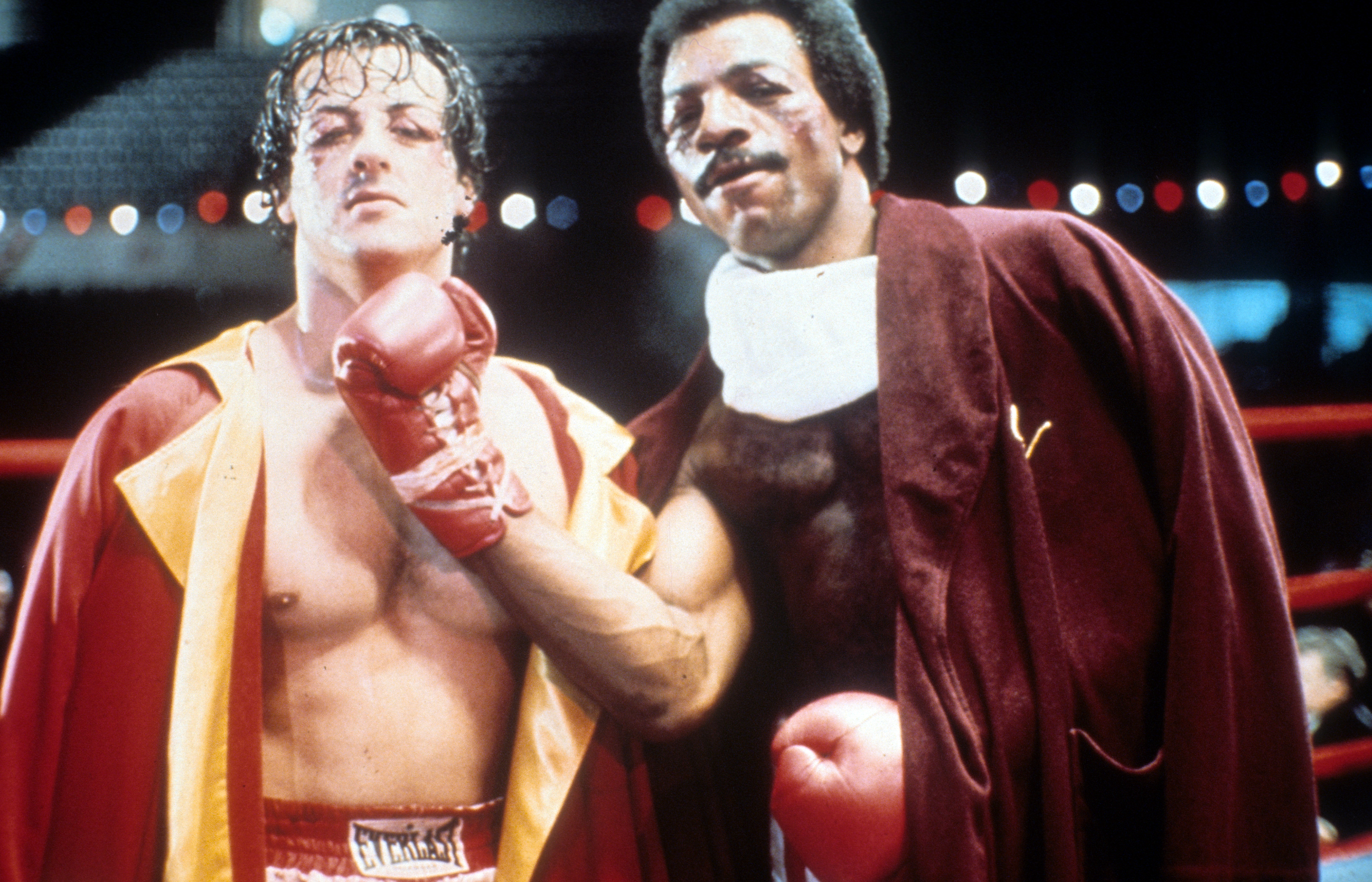 Sylvester Stallone and Carl Weathers on set of the film 'Rocky', 1976 | Source: Getty Images