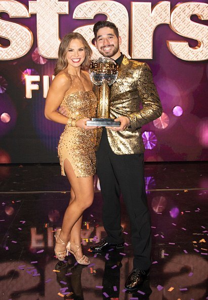 Alan Bersten and Hannah Brown pose at "Dancing with the Stars" Season 28 Finale at CBS Television City on November 25, 2019 in Los Angeles, California | Photo: Getty Images | Photo: Getty Images