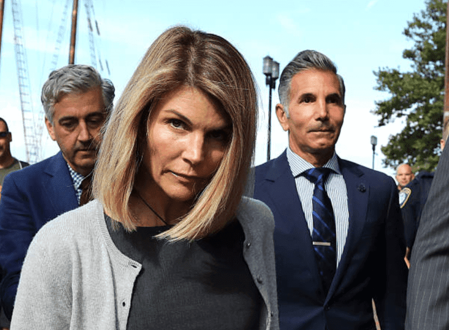 For the role in the national college admission scandal, Lori Loughlin and her husband, Mossimo Giannulli, leave the John Joseph Moakley United States Courthouse, on Aug. 27, 2019, Boston | Source: John Tlumacki/The Boston Globe via Getty Images