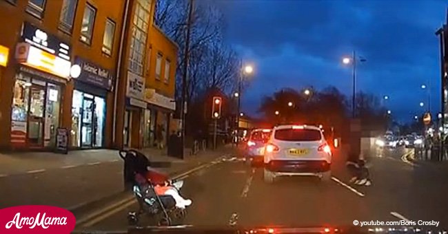 Disturbing! Dashcam captures toddler in a pram rolling into the path of a moving car