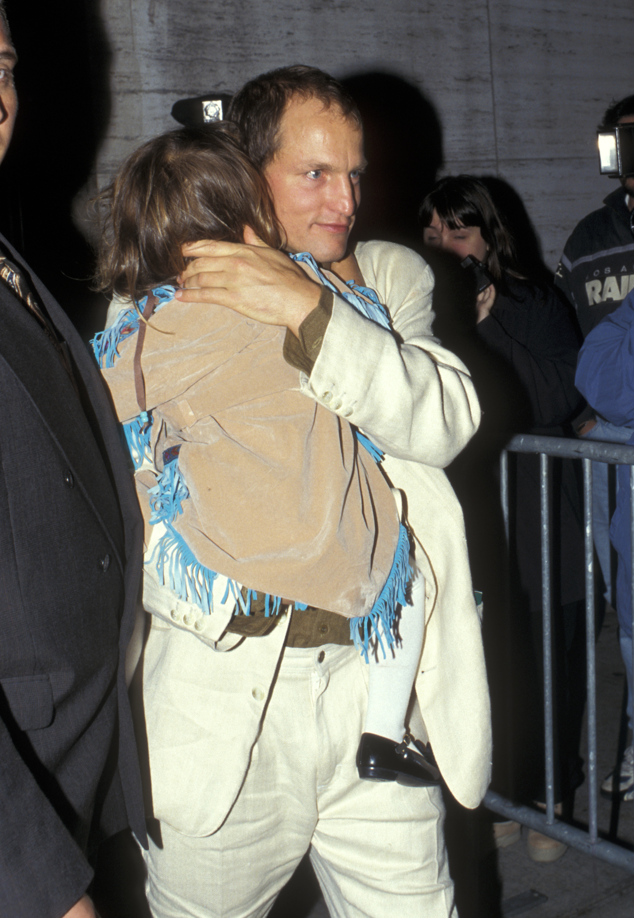 Woody Harrelson and one of his children at the New York Film Festival premiere of "The People vs. Larry Flynt," on October 13, 1996 | Source: Getty Images