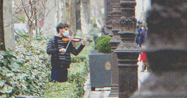 Paul always played violin at the park. | Source: Shutterstock