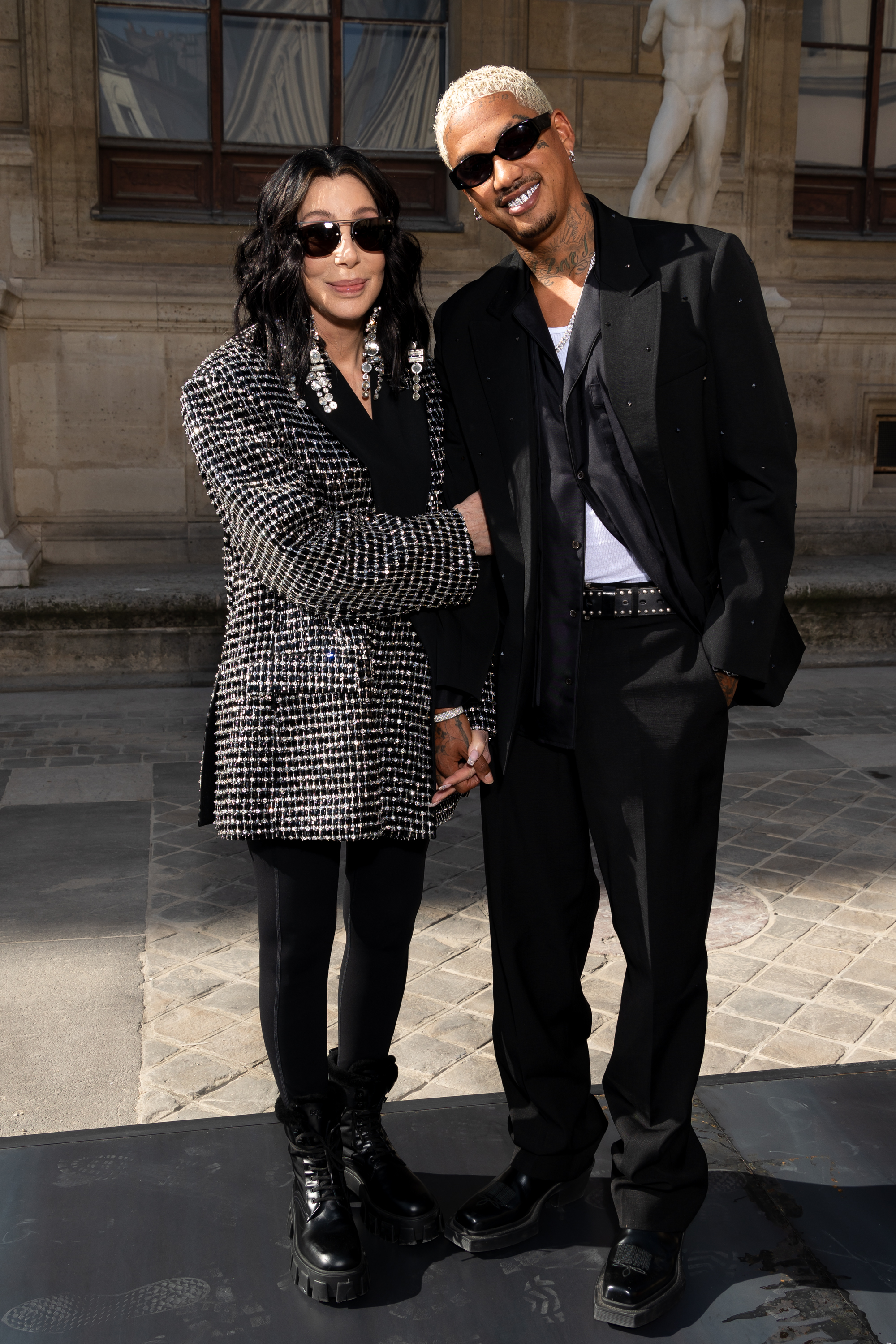 Cher and Alexander Edwards at the Valentino womenswear Spring/Summer 2024 show as part of Paris Fashion Week on October 1, 2023, in France. | Source: Getty Images
