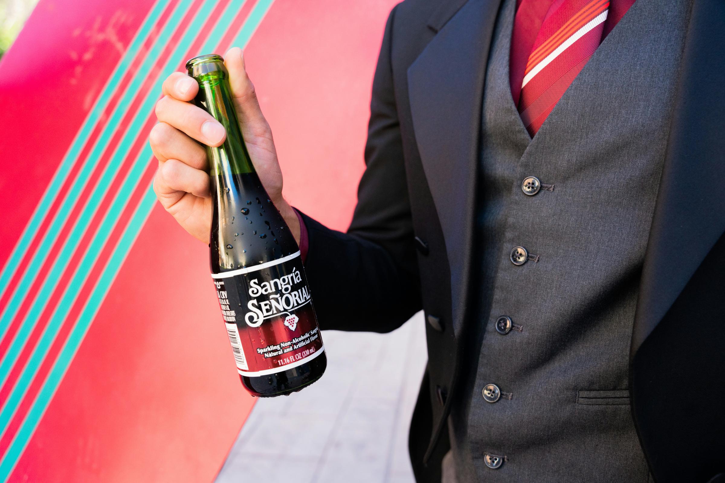 A man holding a beverage | Source: Unsplash