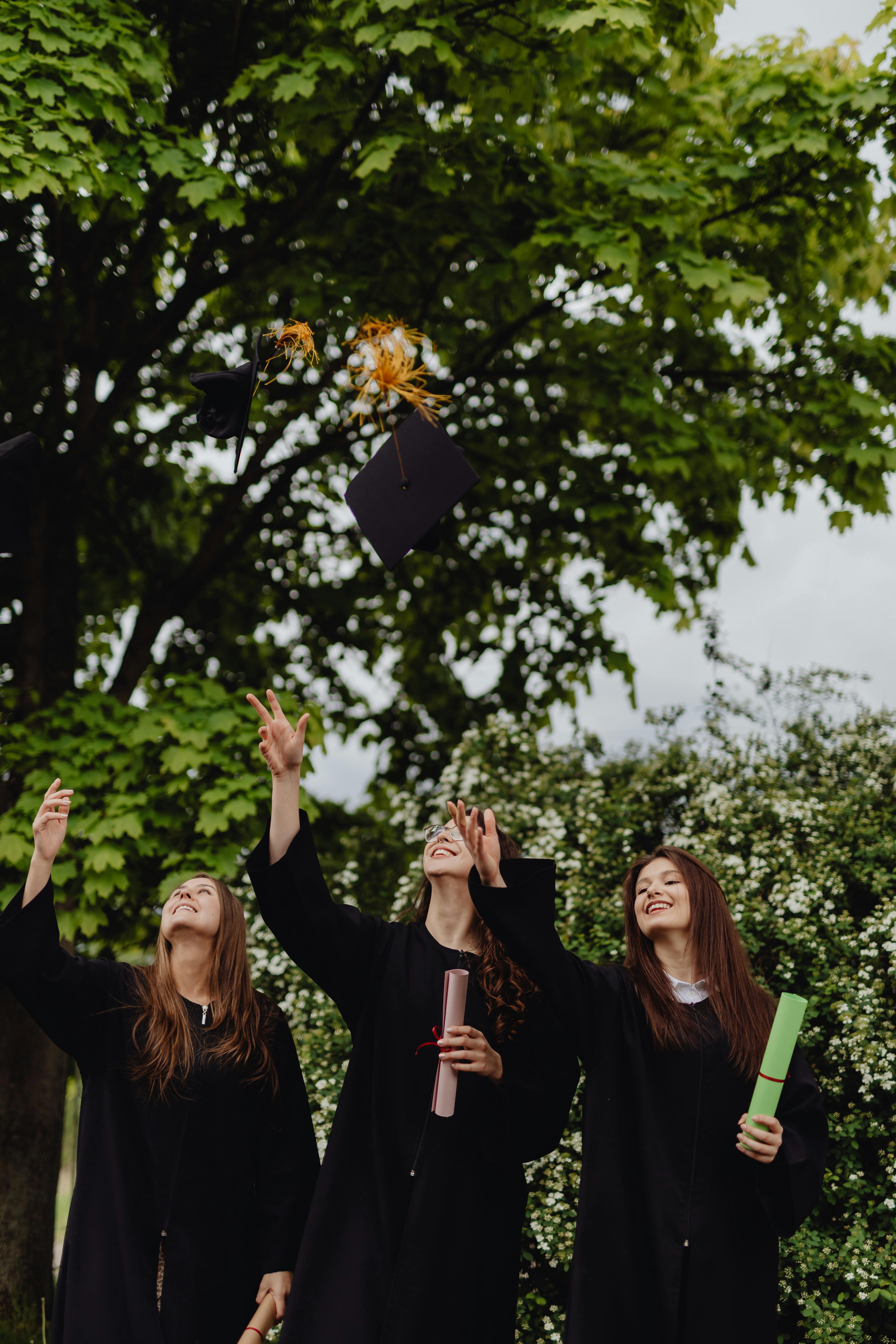 Woman throwing graduation hats | Source: Pexels