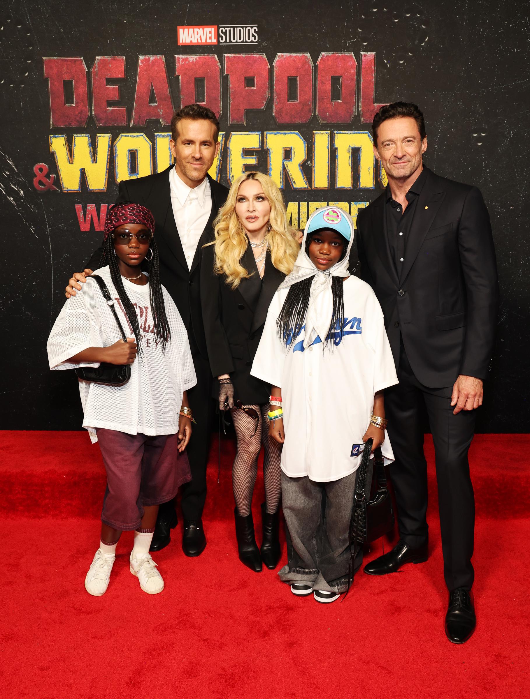 Madonna with her daughters, Ryan Reynolds, and Hugh Jackman at the "Deadpool & Wolverine" world premiere on July 22, 2024, in New York. | Source: Getty Images