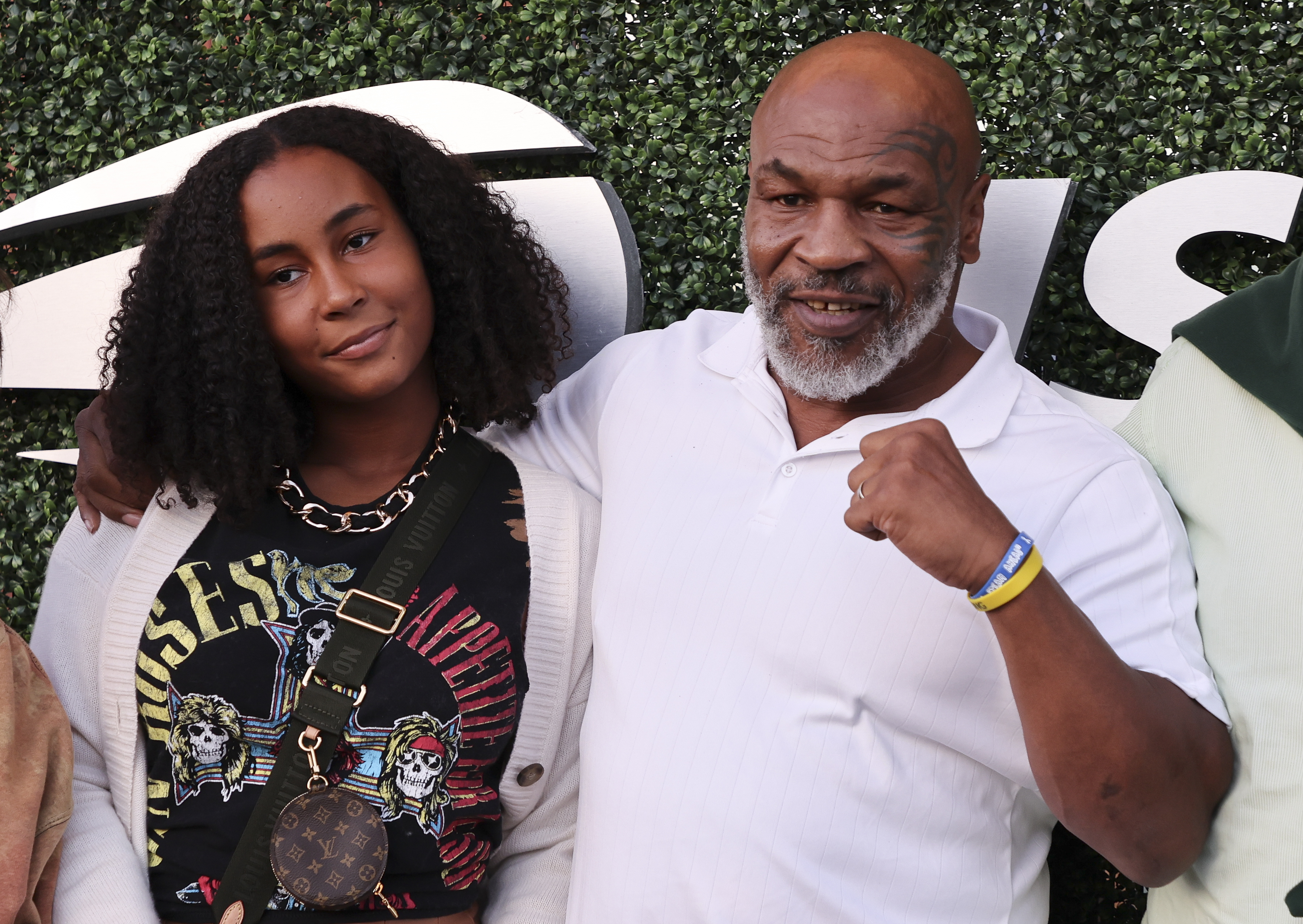 Mike Tyson and his daughter Milan Tyson at Serena Williams' match at Arthur Ashe Stadium during Day 5 of the US Open 2022, in Queens, New York City | Source: Getty Images