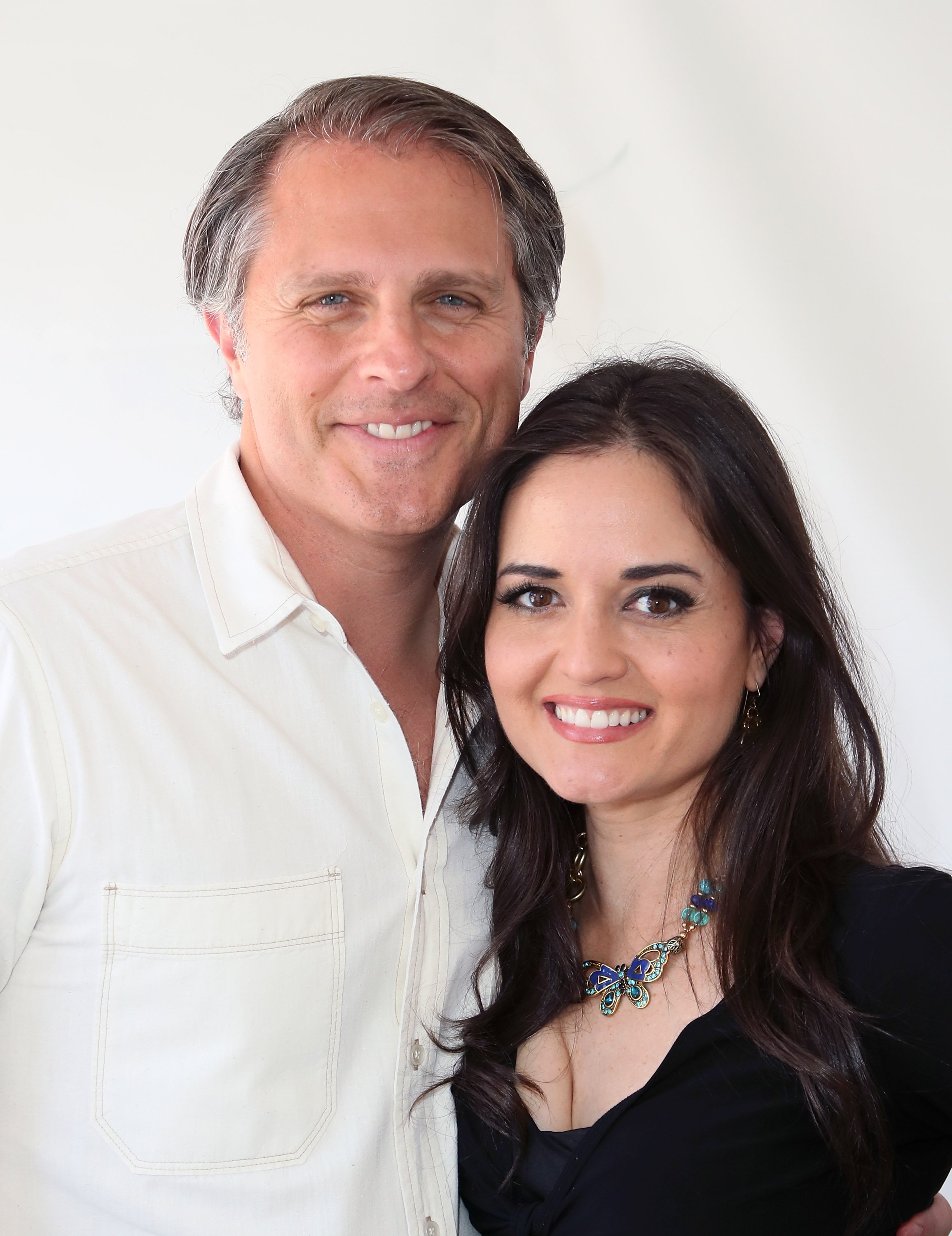 Danica McKellar and Scott Sveslosky pose for a photo at the 23rd LA Times Festival of Books at USC on April 21, 2018, in Los Angeles, California | Source: Getty Images
