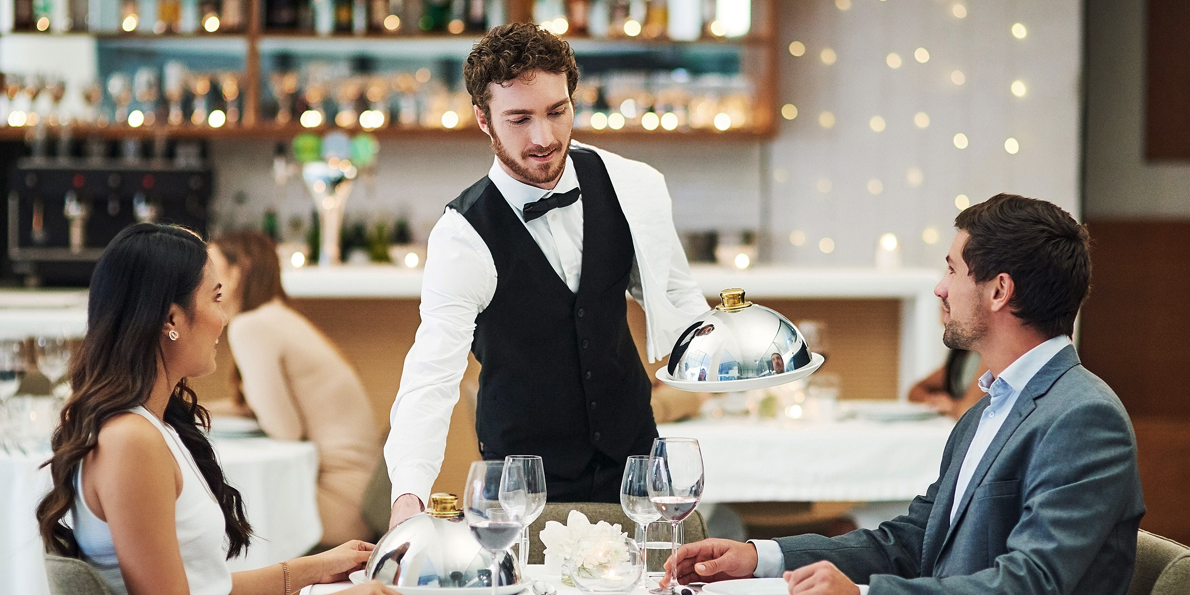 A couple sitting in a restaurant | Source: Shutterstock