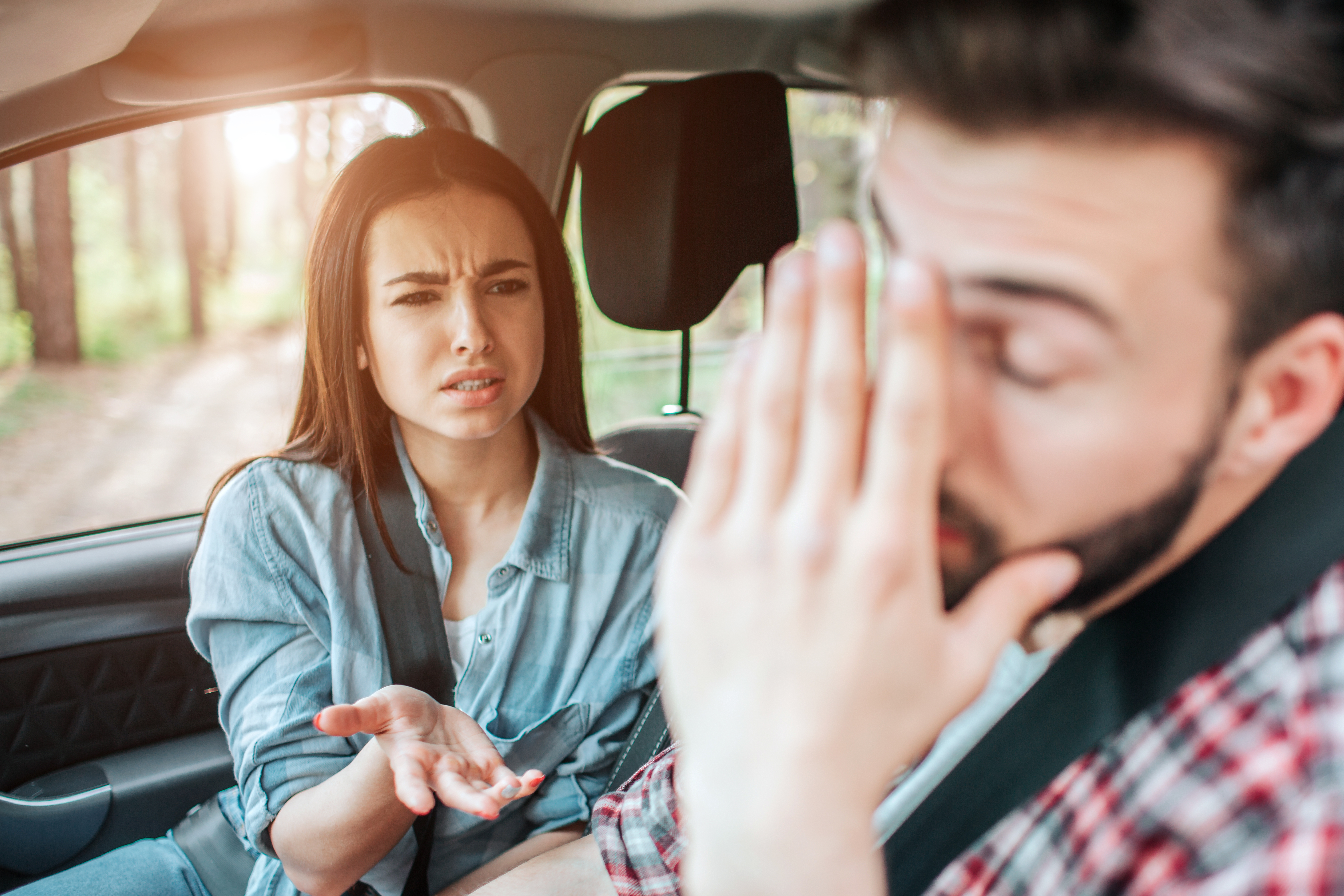 A couple arguing in the car | Source: Shutterstock