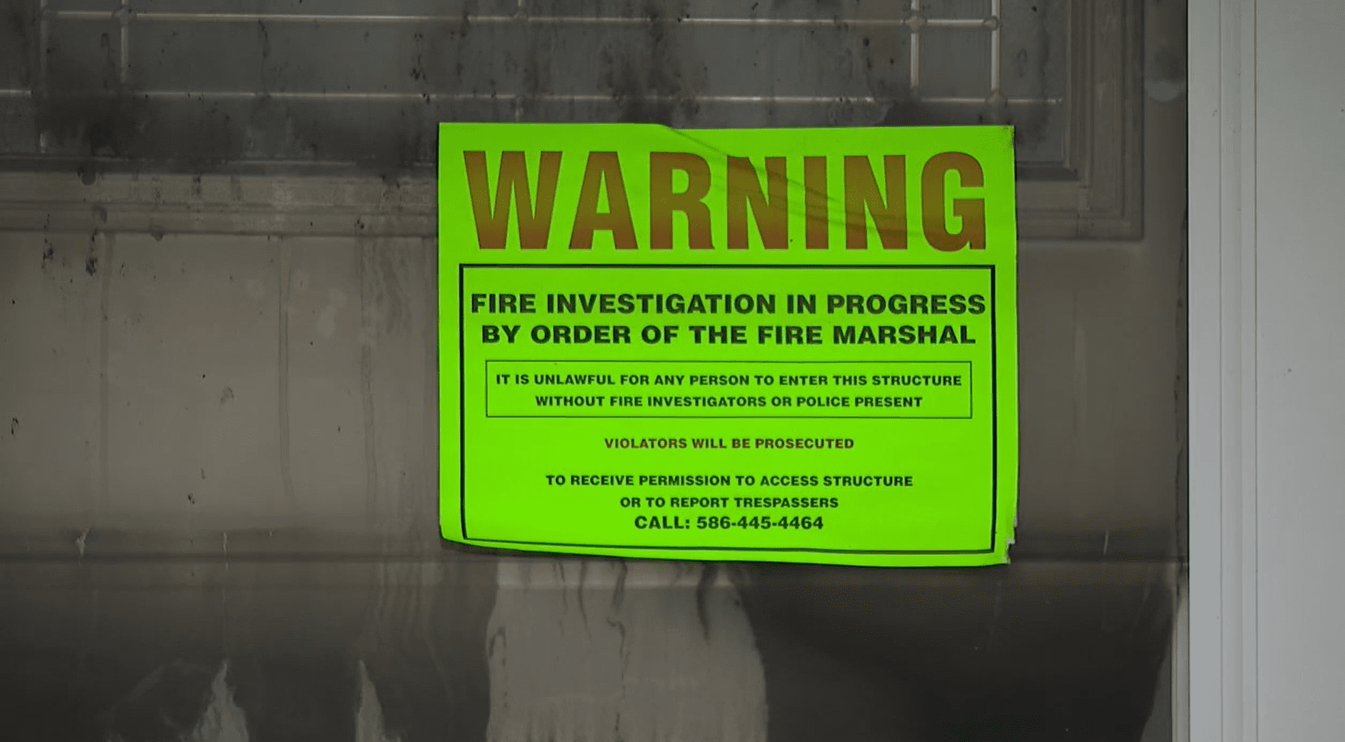 A warning and no entry sign stating that a house is under a fire investigation. │Source: Fox 2 Detroit