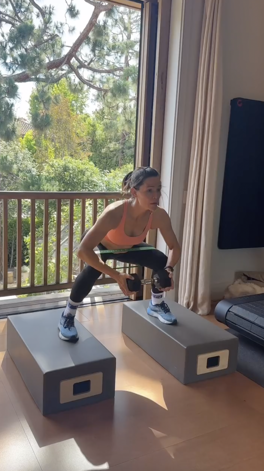 A screenshot from a video of Jennifer Garner doing some squats as part of her training for her role as Elektra, posted on August 6, 2024 | Source: Instagram/jennifer.garner