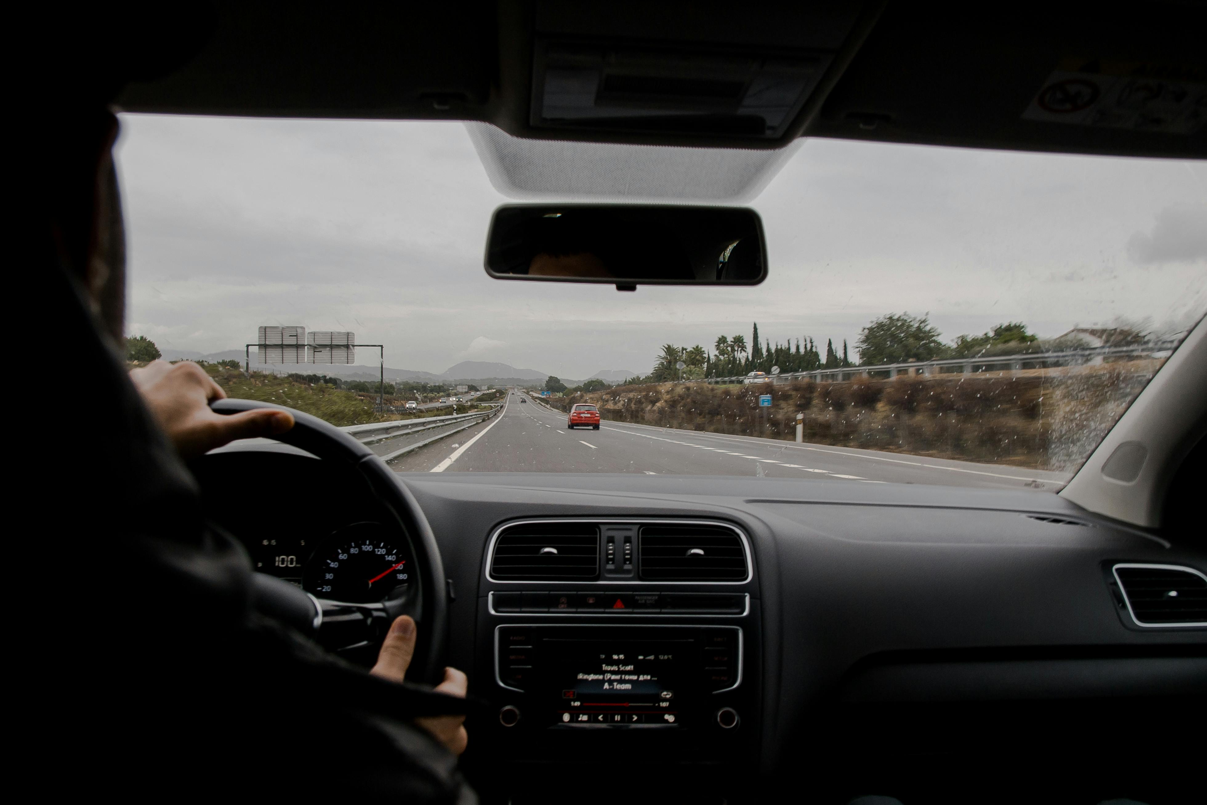 A person driving a car | Source: Pexels