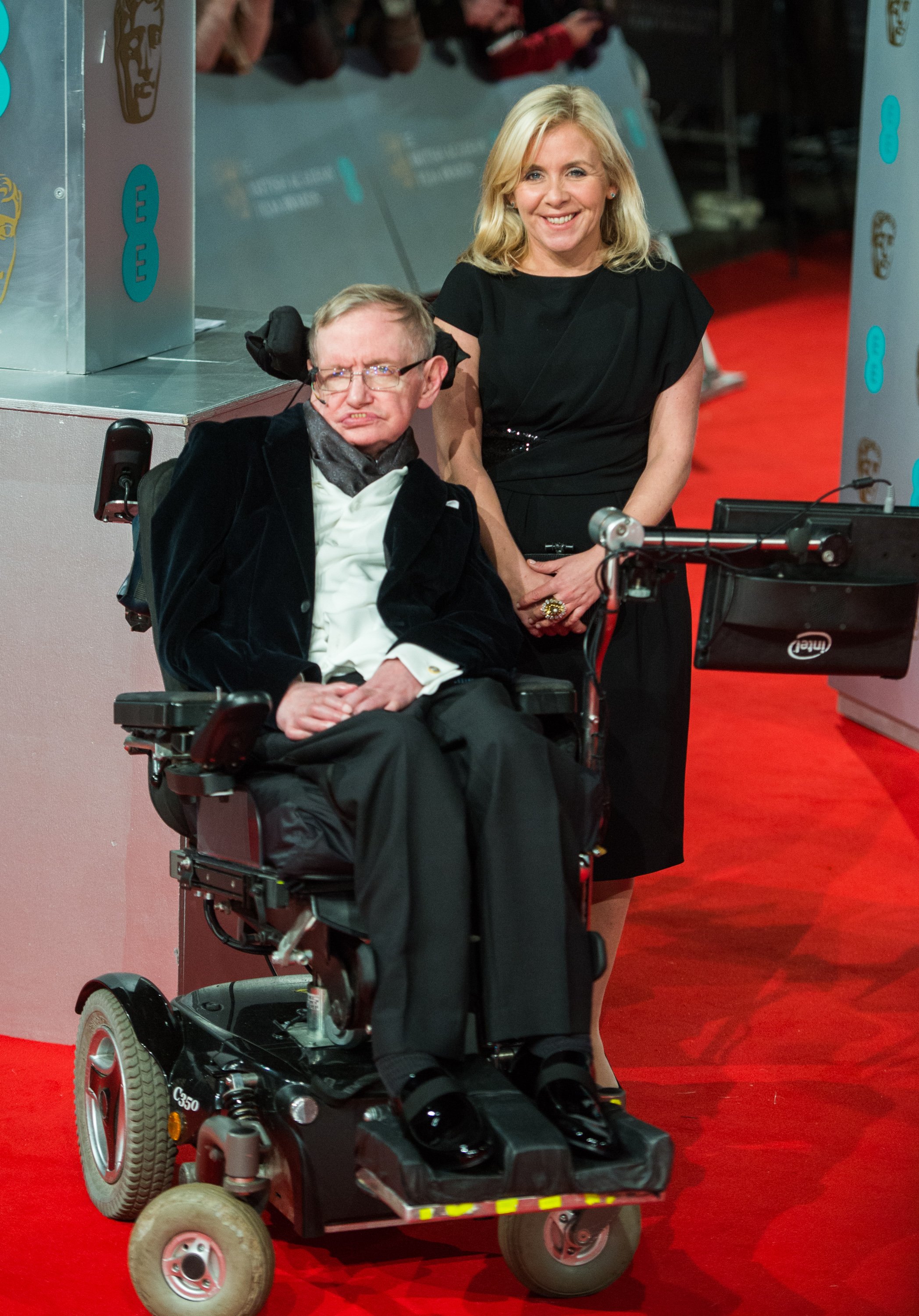 Lucy Hawking and Stephen Hawking pose at the EE British Academy Film Awards at The Royal Opera House on February 8, 2015 in London | Source: Getty Images
