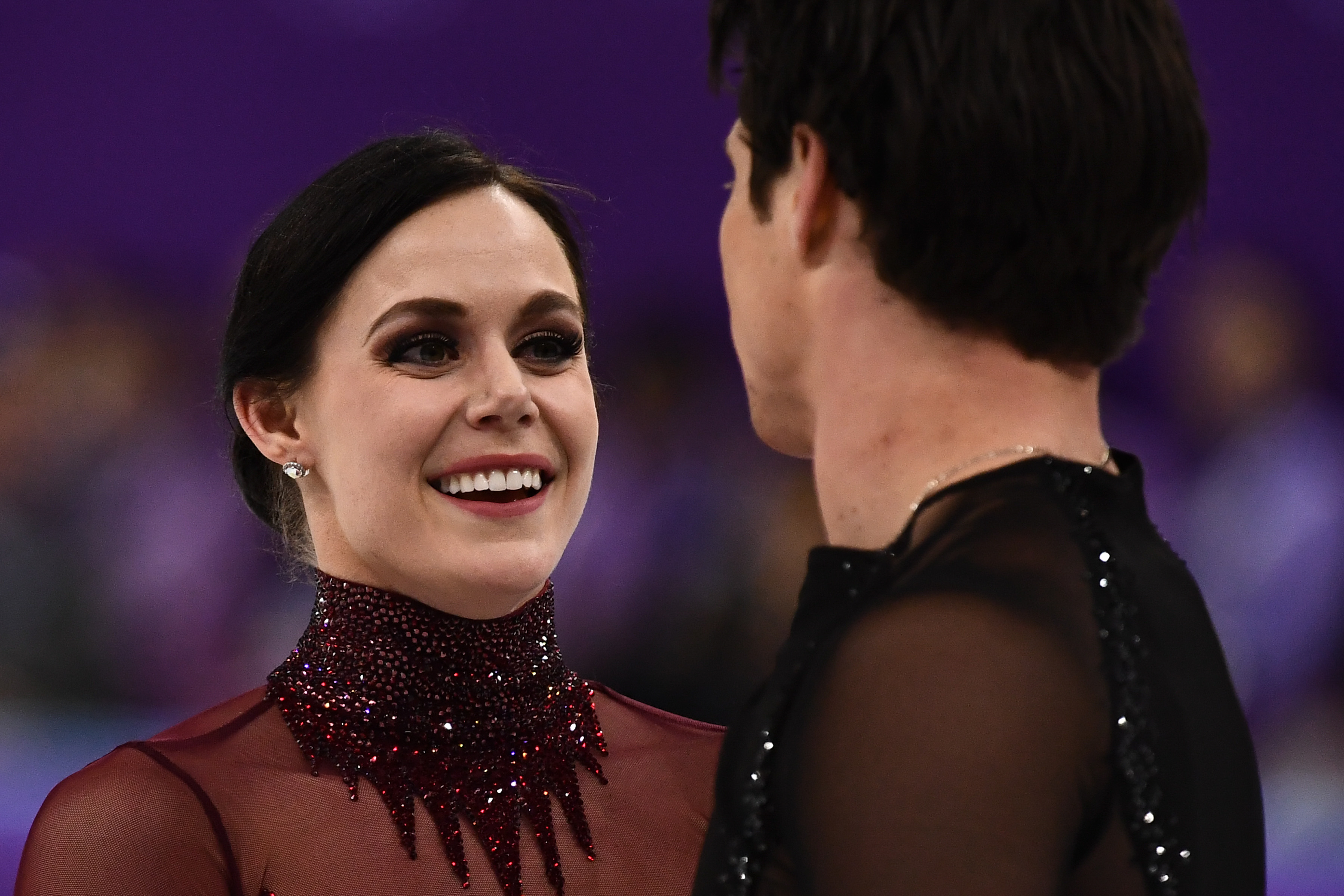 Tessa Virtue and Scott Moir react following the ice dance free dance of the figure skating event during the Pyeongchang 2018 Winter Olympic Games at the Gangneung Ice Arena in Gangneung on February 20, 2018 | Source: Getty Images