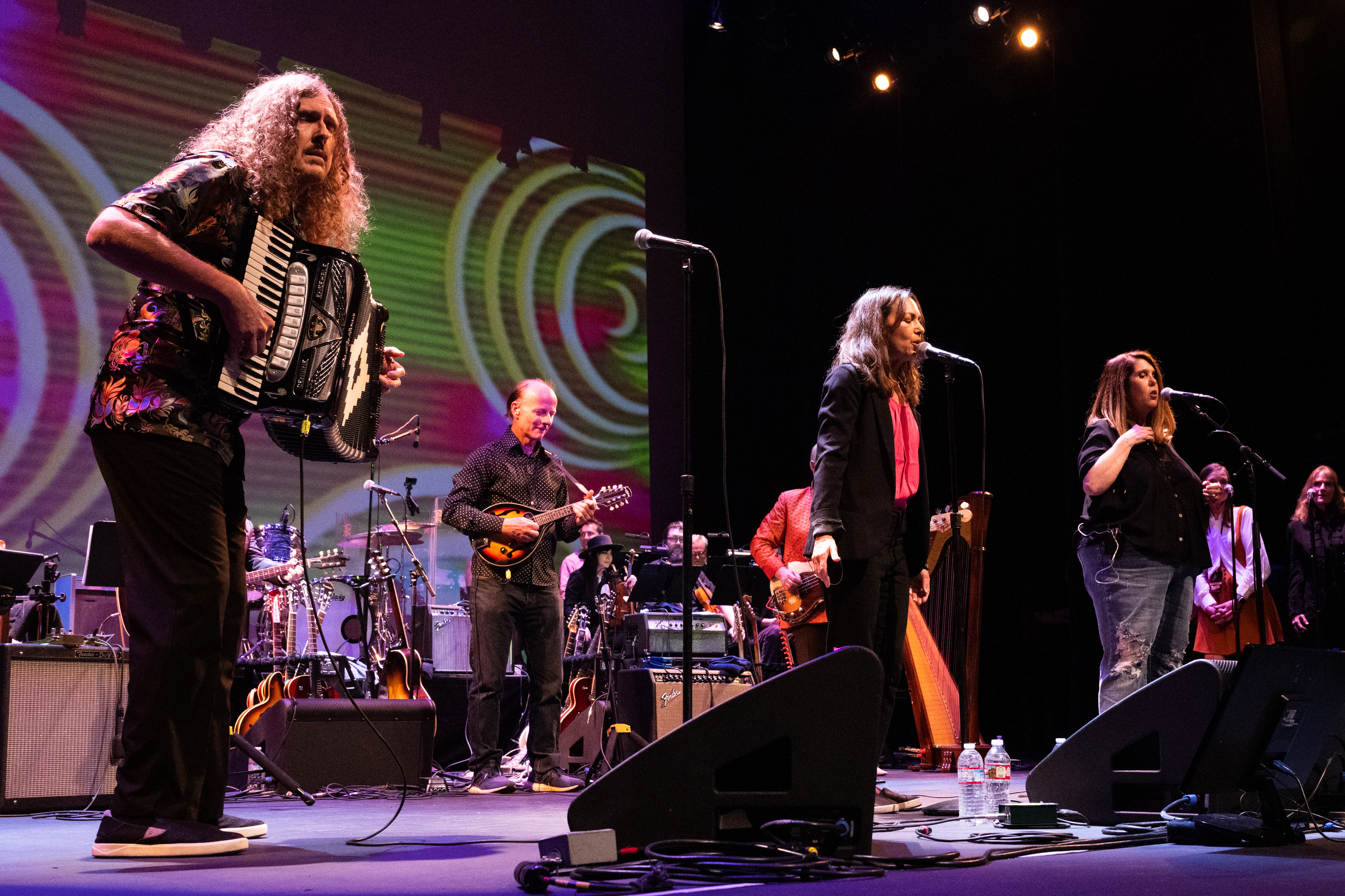 Musicians Weird Al Yankovic (L), Susanna Hoffs (C), and Owen Elliot-Kugel (R) perform onstage during The Wild Honey Foundation's 50th Anniversary All-Star Celebration Of The Nuggets Compilation Album at Alex Theatre on May 19, 2023, in Glendale, California. | Source: Getty Images