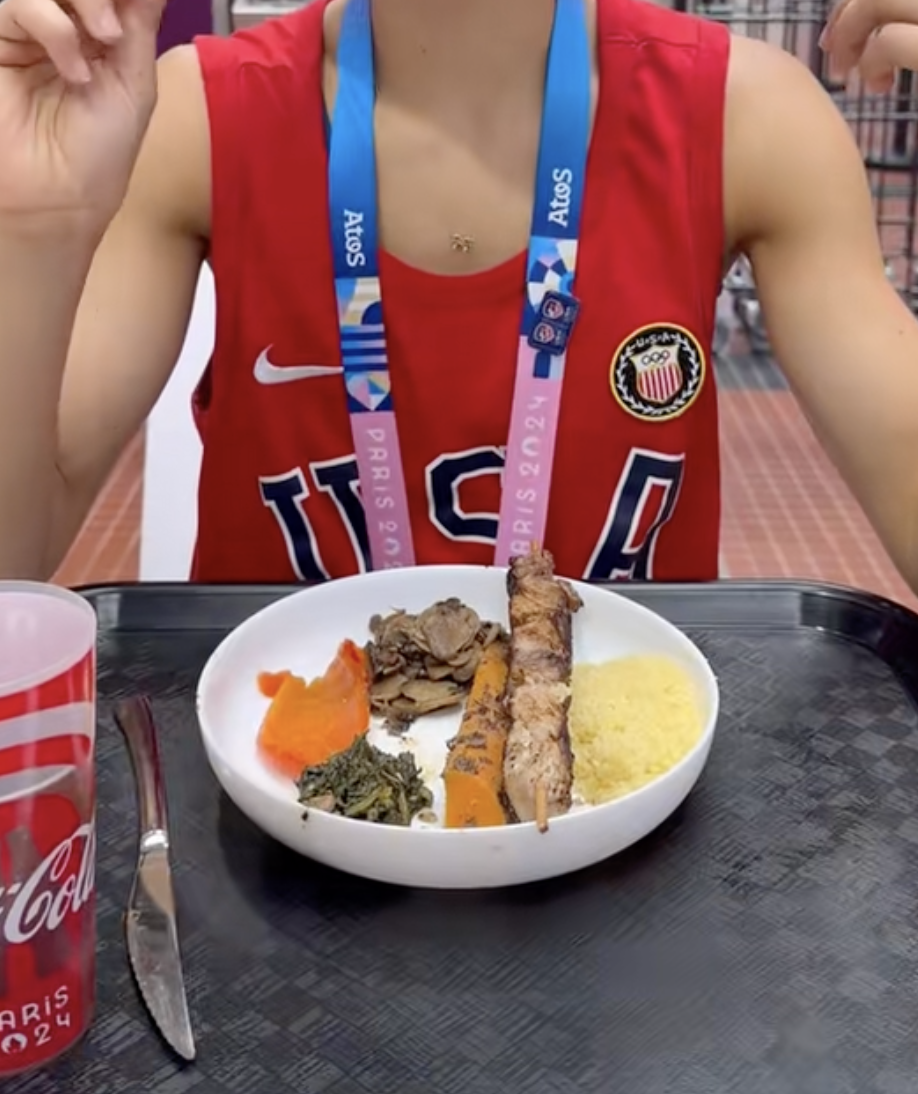 A screenshot of a meal at the Olympic Village dining hall posted by Lee Kiefer and Gerek Meinhardt | Source: TikTok/oldmarriedolympians