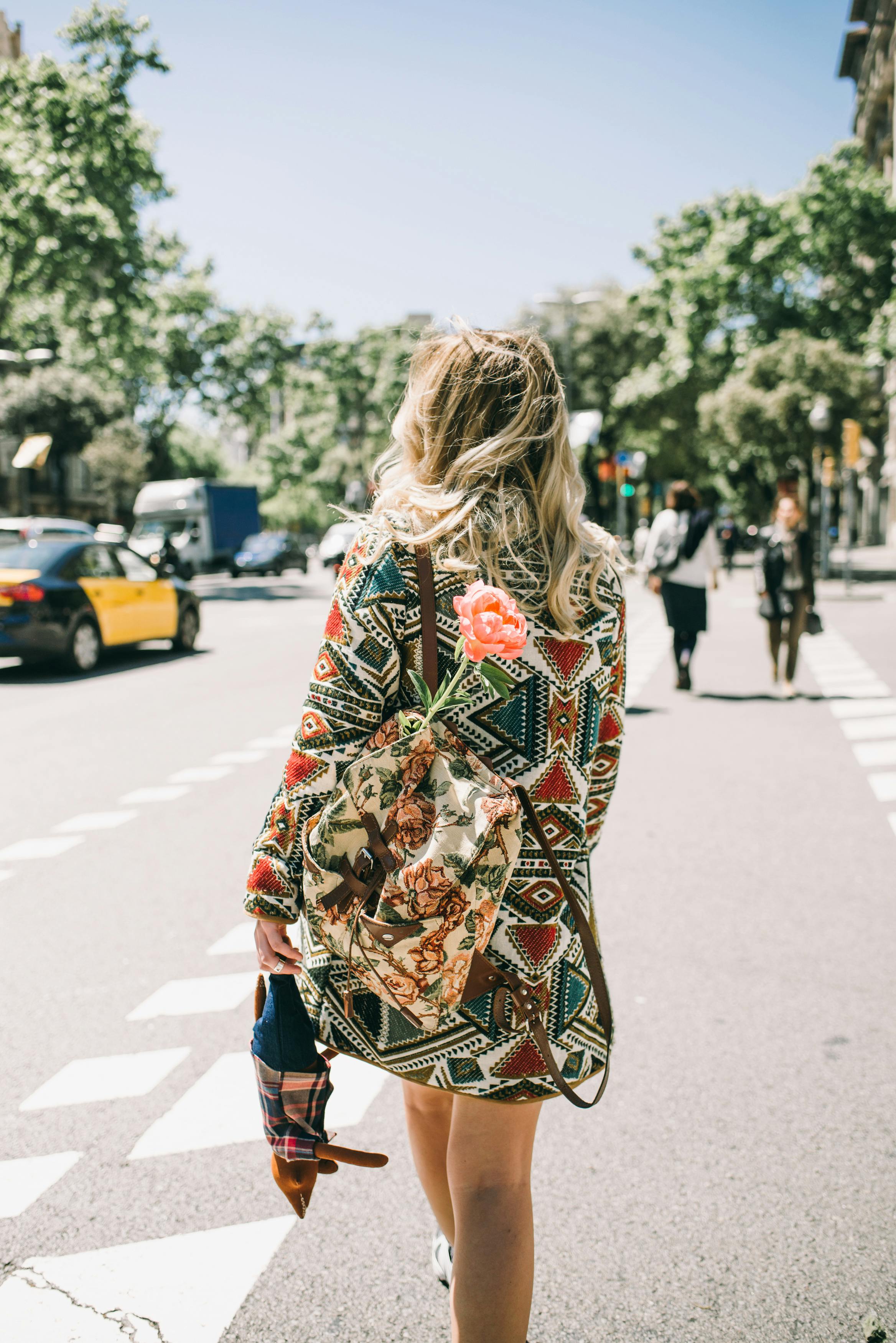 A woman walking away | Source: Pexels