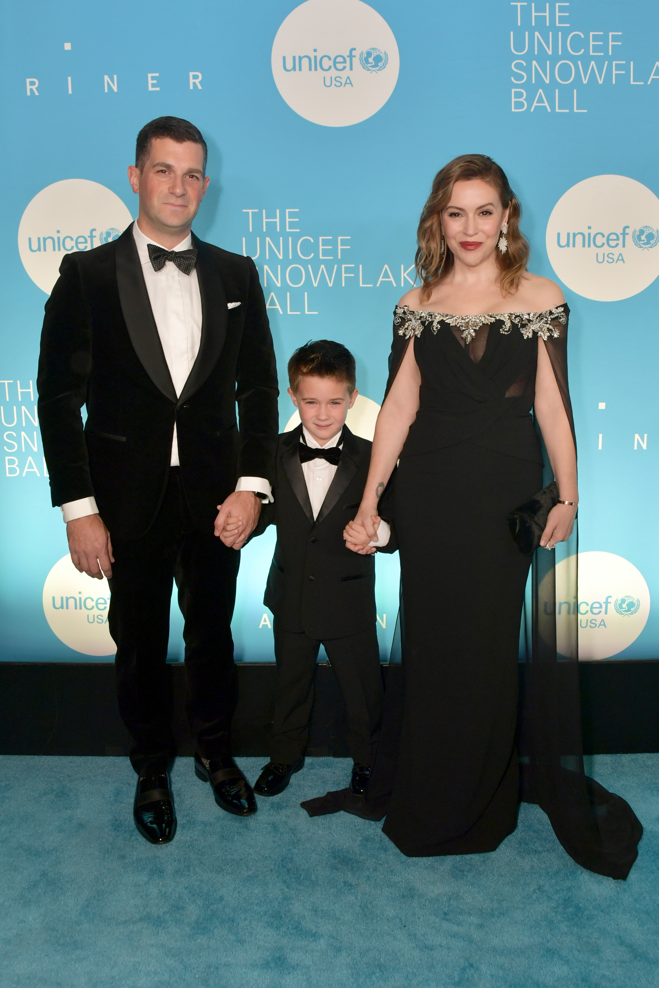 David and Milo Bugliari with Alyssa Milano at the 14th Annual UNICEF Snowflake Ball in New York City on November 27, 2018 | Source: Getty Images
