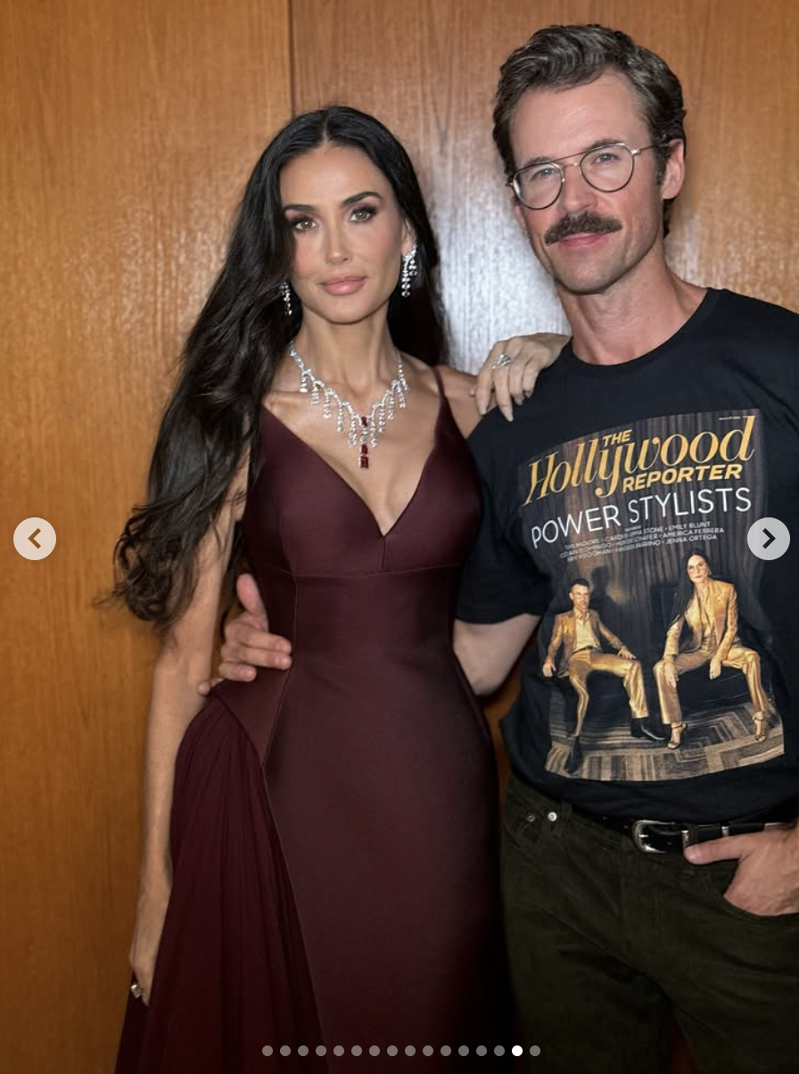 Demi Moore poses with her stylist, Brad Goreski, in a behind-the-scenes moment — effortlessly elegant in her sculpted gown, exuding quiet confidence off the red carpet. | Source: Instagram/demimoore